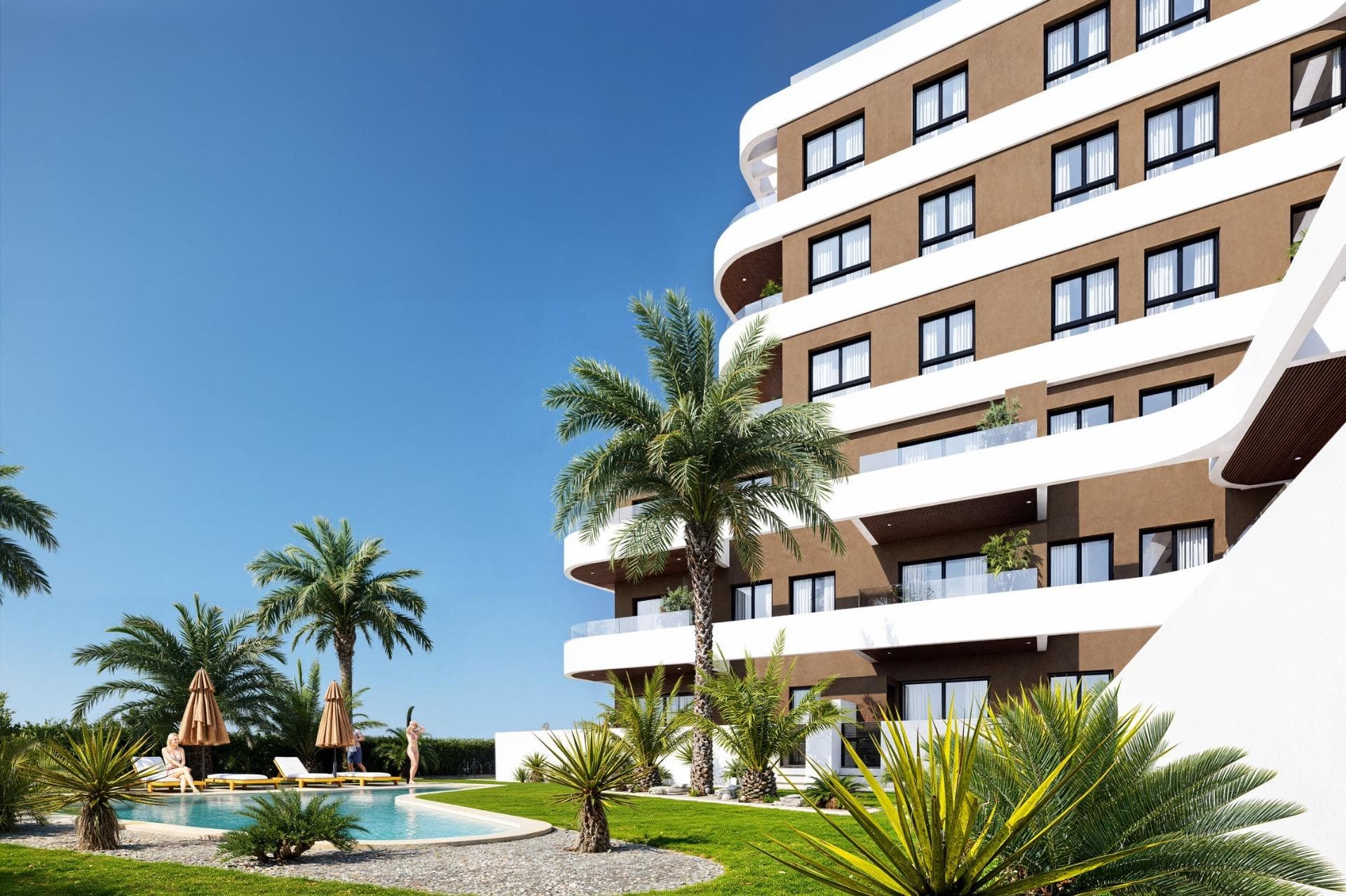 New Build Apartments in Guardamar del Segura – Modern Living Just 1.4 km from the BeachDiscover a new residential development in Guardamar del Segura, Alicante, offering just 19 exclusive, modern homes designed for comfortable, contemporary living on the Costa Blanca. Ideally located just 1.4 km from the beach and a short walk from the town center, this development combines style, practicality, and a prime coastal setting.Exclusive Residential Project with Limited AvailabilityThis boutique development features 2 and 3-bedroom apartments with a range of layouts to suit different needs:Ground-floor units with spacious private terracesMid-level apartments with generous balconies or open terraces.A spectacular penthouse with a private solarium and swimming poolEach property showcases elegant, curved architectural lines, glass railings, and modern finishes—ideal for both year-round residence or a luxurious holiday retreat.Premium Finishes and Energy-Efficient FeaturesDesigned for comfort and sustainability, each home includes:Reinforced front door for added securityFully furnished kitchen with appliances includedEnergy-efficient aerothermal system for hot waterPrivate parking space included in the priceThe building also features a communal swimming pool and landscaped garden areas, perfect for enjoying the sunny Mediterranean climate.Prime Location in Guardamar del SeguraSituated in a well-connected and vibrant part of Guardamar, this development provides easy access to nature, beaches, and essential services. Residents enjoy proximity to supermarkets, restaurants, medical centers, parks, and the town’s famous pine forest and dunes.Key distances:Guardamar town center – 1 kmClosest beach – 1.4 kmMarina – 2 kmReina Sofía Park – 1.5 kmLa Marquesa Golf (Ciudad Quesada) – 9 kmHabaneras Shopping Center (Torrevieja) – 13 kmAlicante-Elche Airport – 33 kmPublic transport connections include direct bus lines to Alicante and Torrevieja, offering easy access without the need for a car.Secure Your Apartment on the Costa BlancaWhether you’re looking for a permanent residence, vacation property, or smart investment, this new development in Guardamar del Segura is the perfect choice. Contact us today to learn more or reserve your new home by the sea.
