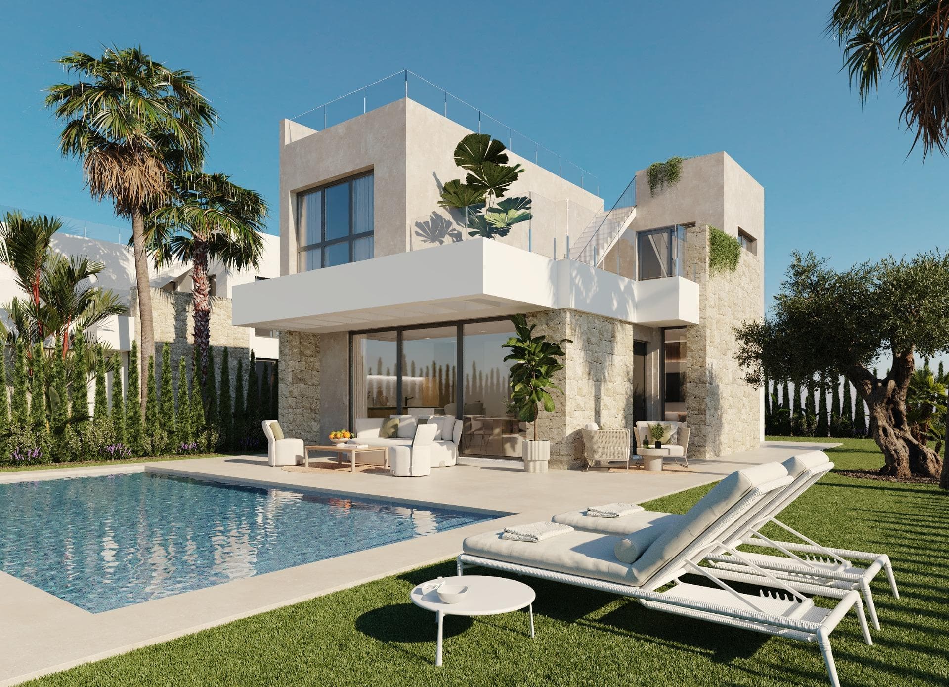 Modern New Build Villas with Sea Views in Finestrat, AlicanteExclusive Development in a Prime LocationLocated in one of the most sought-after areas of the Costa Blanca, this exclusive residential project offers 18 independent villas with a modern and functional design. Situated close to Finestrat (4 km) and Benidorm (5 km), the villas enjoy privileged surroundings with panoramic sea views and direct views of the prestigious Puig Campana Golf Course. Alicante International Airport is just 40 km away, making travel convenient and efficient.Contemporary Design and Spacious LayoutEach villa has been carefully designed to combine elegance, comfort, and practicality. With private plots from 330 m² to 460 m², these homes are distributed across two floors, offering open and luminous spaces. Some units also include a 66 m² basement with patio, featuring two additional bedrooms, two bathrooms, and a living area, providing extra versatility for guests or leisure activities.Outdoor Living and Private AmenitiesEvery property is delivered with a fully finished garden, private swimming pool, perimeter fencing, and pedestrian and vehicle access gates. The rooftop solarium offers the perfect space to relax, enjoy the sun, and admire breathtaking Mediterranean views. The spacious terraces and landscaped areas are designed for outdoor living, making the most of the region’s exceptional climate.Interiors with Premium FinishesThe ground floor features an open-plan concept with living room, dining area, and fully equipped modern kitchen with quartz worktop and integrated appliances. Floor-to-ceiling windows flood the home with natural light and create seamless indoor-outdoor living. A ground-floor bedroom adds flexibility, while the upper floor hosts two more bedrooms, including the master suite with walk-in wardrobe, private bathroom, and 30 m² terrace with sea views. High-quality finishes include white lacquered interior carpentry, fitted wardrobes, thermal break exterior carpentry, motorized shutters in bedrooms, and 3 bathrooms with designer furniture, suspended toilets, and glass screens.Lifestyle and SurroundingsThese villas offer a privileged lifestyle close to golden beaches, shopping centers, and family attractions such as Terra Mítica Theme Park (5 km). For golf lovers, Puig Campana Golf (1 km) and Villaitana Golf (6 km) with its two Nicklaus Design courses provide a world-class experience.Your New Home on the Costa BlancaWhether as a holiday home or permanent residence, these modern villas in Costa Blanca combine luxury, location, and comfort. Contact us today to arrange a visit and take the first step towards your dream home in Spain.