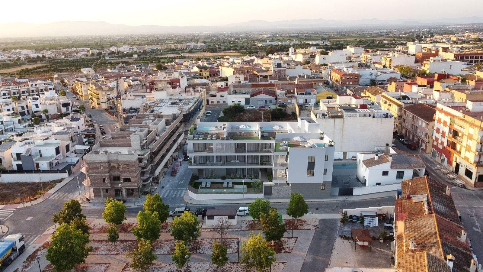 New Build Apartments in Benijofar with a central locationContemporary Residential Living in BenijofarThis exclusive new development in Benijofar offers just 11 modern homes designed to combine contemporary architecture, comfort and high quality materials. The project includes ground floor and first floor apartments with spacious terraces, as well as penthouses with terraces and private solariums. Located in a central yet peaceful area of Benijofar and facing a large green zone, the residential enjoys excellent natural light throughout the day and a pleasant open outlook.Modern Apartments with Premium FeaturesEach property has been carefully designed to meet high standards of quality and functionality. All homes include a private garage space and storage room in the basement, with convenient lift access. Residents can also enjoy a stylish communal swimming pool surrounded by landscaped common areas, ideal for relaxing and socializing.The penthouses stand out with their generous solariums, offering the option to install an outdoor kitchen and featuring a jacuzzi, creating a unique outdoor space perfect for entertaining or unwinding under the Mediterranean sun.High Quality Finishes and Energy EfficiencyThe residential has been built with great attention to durability, efficiency and modern aesthetics. Features include:Preinstallation of ducted air conditioning and heatingExterior carpentry with thermal break and double glazingAerothermal system for domestic hot waterFurnished kitchens with appliances includedInterior and exterior lighting package includedBathrooms with vanity units, mirrors and shower screensJacuzzi included in penthouse solariumsEvery detail has been selected to ensure a comfortable, efficient and elegant living environment.Benijofar Lifestyle and LocationBenijofar is one of the most charming towns in the Vega Baja area, known for its relaxed atmosphere, safety and excellent quality of life. All daily services such as supermarkets, schools, medical centers, restaurants and leisure areas are within 5 minutes. The town offers the perfect balance between traditional Spanish life and modern amenities.Key Distances to Points of InterestGuardamar del Segura beaches: 8 kmLa Finca and La Marquesa golf courses: 6 kmRojales water park: 4 kmZenia Boulevard shopping center: 17 kmAlicante Airport: 35 kmYour New Home on the Costa Blanca AwaitsThese new build apartments in Benijofar offer an exceptional combination of location, quality and design. Contact us today to arrange a viewing and secure your new home on the Costa Blanca.