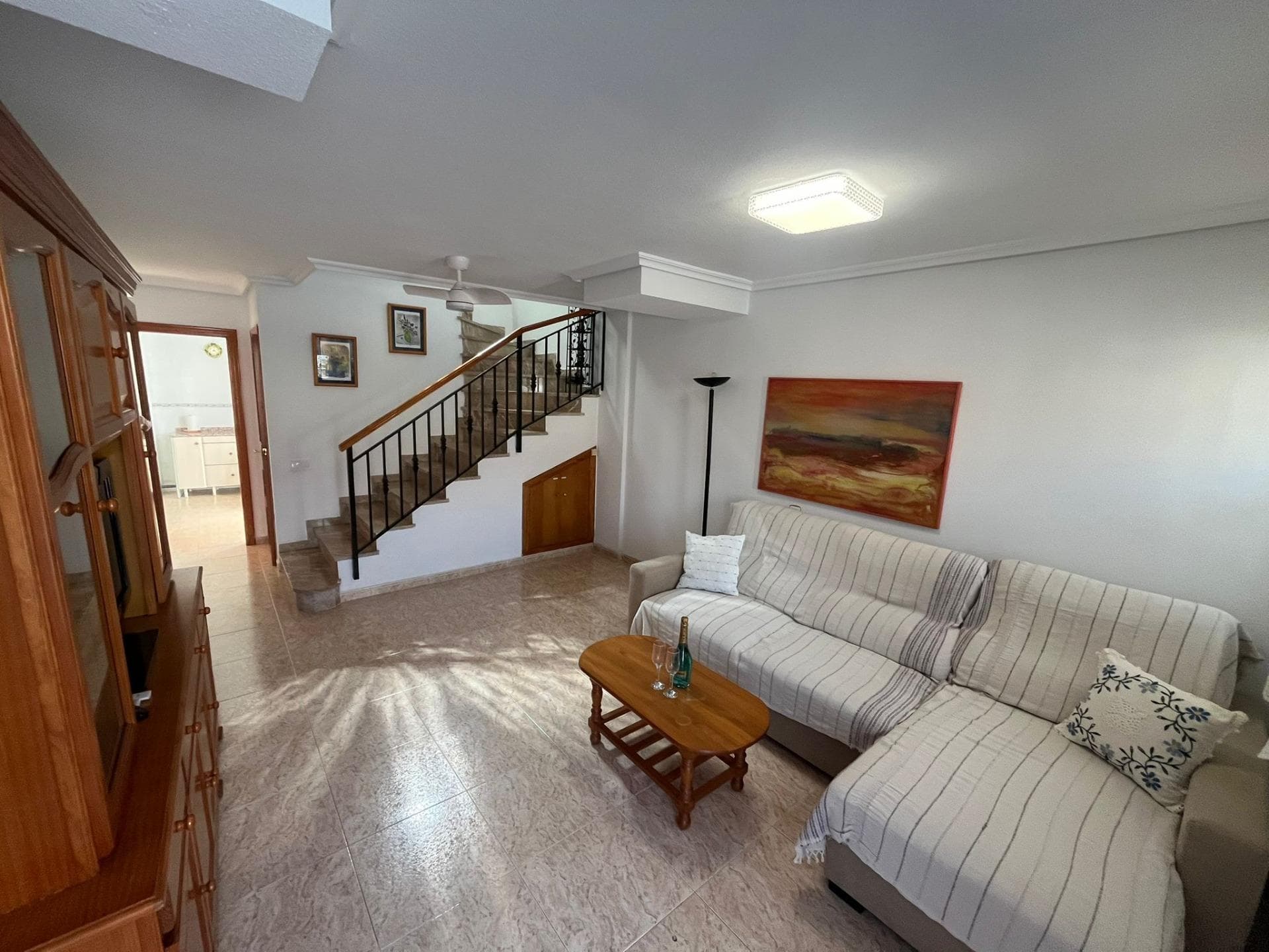 Duplex in San Pedro del Pinatar just 300 metres from the beach. Cosy duplex for sale in the area of San Pedro del Pinatar, with an area of 96 m² and only 300 metres from the beach. The property has 2 bedrooms, 2 bathrooms, and a functional layout ideal for year-round living or as a second residence. Features of the property: - Fitted kitchen  - Wooden interior carpentry  - Exterior carpentry in lacquered aluminium  - Tiled floor  Extras and amenities:  ✔ Air conditioning  ✔ Security alarm  ✔ Fitted wardrobes  ✔ Balcony and terrace  ✔ Solarium  ✔ Storeroom  ✔ Laundry room  ✔ Furnished  ✔ Very bright  Privileged location: 📍 A few minutes from buses, schools, universities and hospitals. 🏡 Surrounded by parks, children's playgrounds and supermarkets ⛳ Close to golf courses and shopping centres 🌳 Surrounded by trees and green spaces  An excellent opportunity to enjoy a home on the coast with all the comforts. Contact us for more information or to arrange a visit!