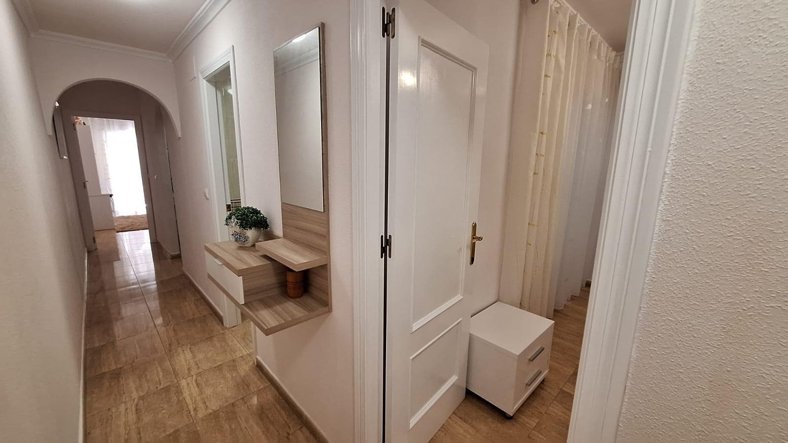 Fantastic opportunity on the Costa Blanca! We present this bright and modern apartment, fully renovated, located in a prime area of Torrevieja, just 500 meters from the beach 🌊 and surrounded by all essential services. 📐 Property features: 🛏️ 2 bedrooms with built-in wardrobes 🚿 1 full bathroom 🍽️ Fully equipped kitchen 🛋️ Bright living-dining room ☀️ South-facing – enjoy sunshine all year round 📏 Total area: 64 m² 🏡 High-quality renovations: White lacquered interior doors Tiled flooring Lacquered aluminum windows High ceilings for added space Balcony and private terrace 🌞 🛠️ Extras: ✅ Elevator 🎥 Video intercom ❄️ Air conditioning 💡 Very bright 🚗 Private parking included 💧 Utilities connected (water and electricity) 📍 Excellent location: 🚶 Just 500m from the beach 🚌 Near the central bus station 🏬 Close to supermarkets, malls, parks 🏥 Near hospitals and medical centers 🎓 Schools and university nearby ⛳ Golf course in the area 🌳 Surrounded by green areas and playgrounds 🏔️ Mountain access for getaways 💶 Community fees: only €410/year 💰 Selling price: €149,000 📞 Don't miss out! Contact us to arrange a visit. Your new life by the sea awaits in Torrevieja. 🌅