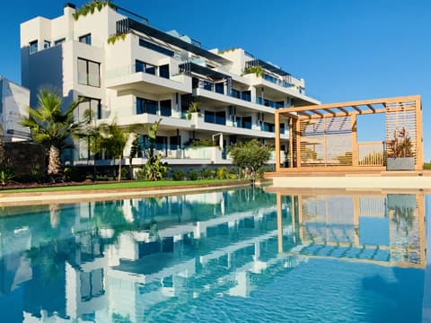 Immediately ready to move in and fully furnished Luxury apartment with panoramic views over the coastline located in one of the most prestigious resorts of the Costa Blanca; Las Colinas Golf Resort.

 This apartment is immediately available and comes: Fully furnished. The very latest home automation. Siemens kitchen appliances. Induction Air conditioning both heat and cooling throughout the house. Underfloor heating in the bathrooms. LED and mood lighting. Electric shutters. Underground private parking space. Beautiful communal garden with swimming pool.

 

