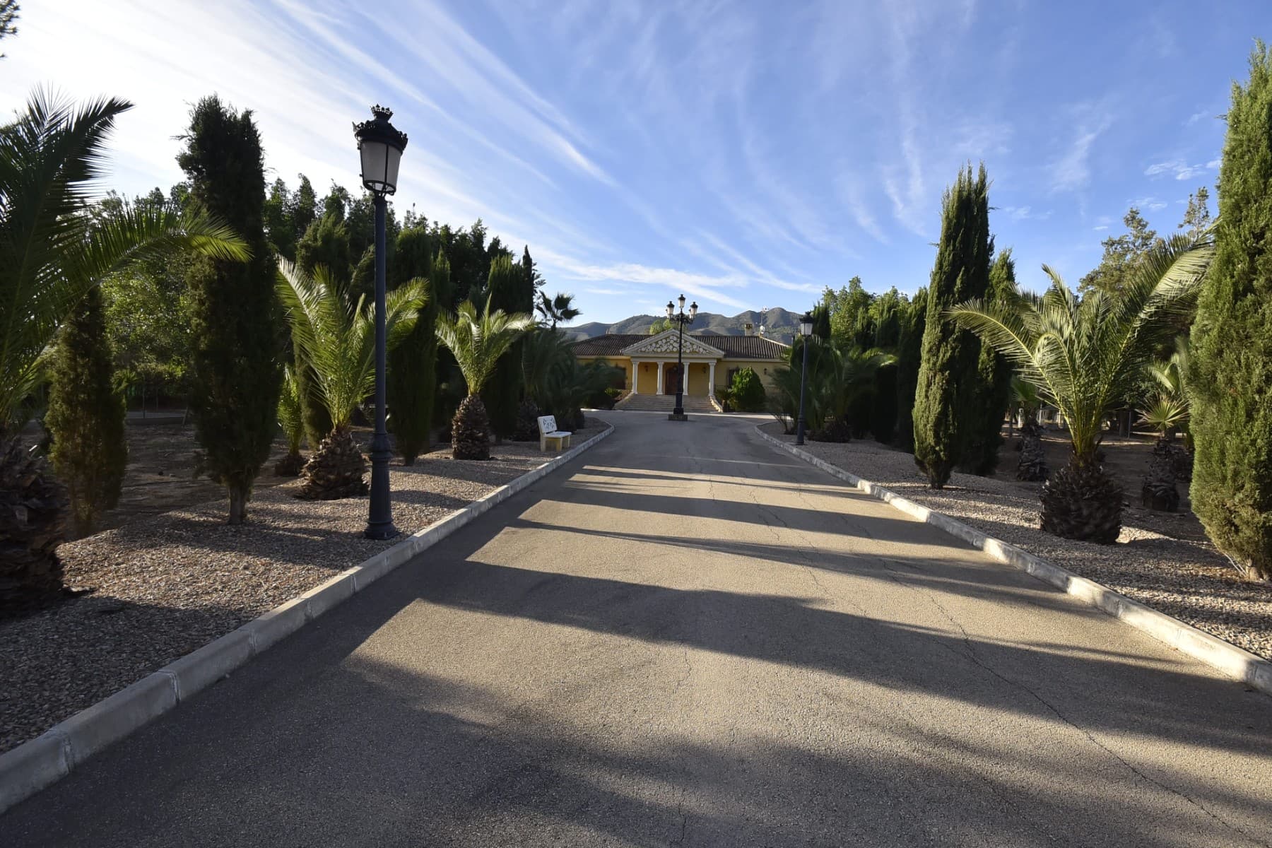 Hacienda with unique mountain views and absolute privacy in La Matanza, Orihuela

 Description of the property This spectacular country house has spectacular views of the Orihuela and Abanilla mountains, in the middle of an oasis of peace, tranquility and relaxation. The plot on which the mansion is located has a plot area of 13,627 m2. The entire building consists of a mansion (430 m2), a house for staff or guests with an outdoor terrace (75 m2) and a warehouse (181 m2). In addition, the house has a garden full of olive trees, palm trees, firs, cypresses, lemon trees and orange trees.

 The ground floor of the luxury mansion has an area of 190 m2 and has 3 bedrooms, 2 bathrooms, a living room, a utility room and a large kitchen. It also has a huge courtyard with an indoor swimming pool of 4 x 9 meters (with jacuzzi, showers and toilet) and two fully equipped kitchens, one outside the living room and the other close to the kitchen. Swimming pool with granite table and chairs of the same type.

 In the basement (240 m2) there is also 1 bedroom, 1 bathroom, 1 cellar and also rooms where games, gym and offices can be installed, as well as 1 garage.

 We can guarantee that all friends and family will be impressed with your country house.

 The house for staff or guests has 2 bedrooms, 1 kitchen, 1 living room, 1 bathroom and an outside terrace.

 The garage can be used as an office, study or hobby room

 This property has been designed in a special way and designed for customers who want to live far away from all the hustle and bustle or noise, but at the same time close to cities, airport, golf course and the sea.

 Details of the villa's location on the map:

 The Hacienda is located in La Matanza. The town has approximately 1,100 inhabitants and administratively belongs to the cultural city of Orihuela.

 Distance to the city of Orihuela approx. 91,000 inhabitants = 10 kilometers Distance to the city of Murcia approximately 438,000 inhabitants = 29 kilometers Distance to the city of Alicante approximately 335,000 inhabitants = 57 kilometers Distance to Alicante airport =50 kilometers Distance to the entrance of the Murcia-Alicante highway = 3 kilometers Distance to the sea =40 kilometers Distance to the golf courses = 24 kilometers

 For more information, we are always ready to help you.
