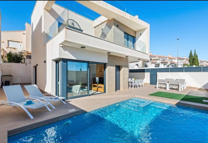 Luxury recent villa in San Miguel

 Discover this beautiful new build villa, quietly located just 2 km from the center of San Miguel. This modern and residential house has three spacious bedrooms and two stylish bathrooms . The private garden with a swimming pool offers the perfect place to relax and enjoy of the Mediterranean climate.

 Situated just 20 minutes from the most beautiful beaches of the Costa Blanca and surrounded by two renowned golf resorts, this property combines tranquility, luxury and an excellent location. The international airports of Alicante (35 minutes) and Corvera – Murcia (40 minutes) are within easy reach accessible, making this the ideal investment for both permanent residence and holiday stay.

 Want to know more about this exclusive villa? Contact us!