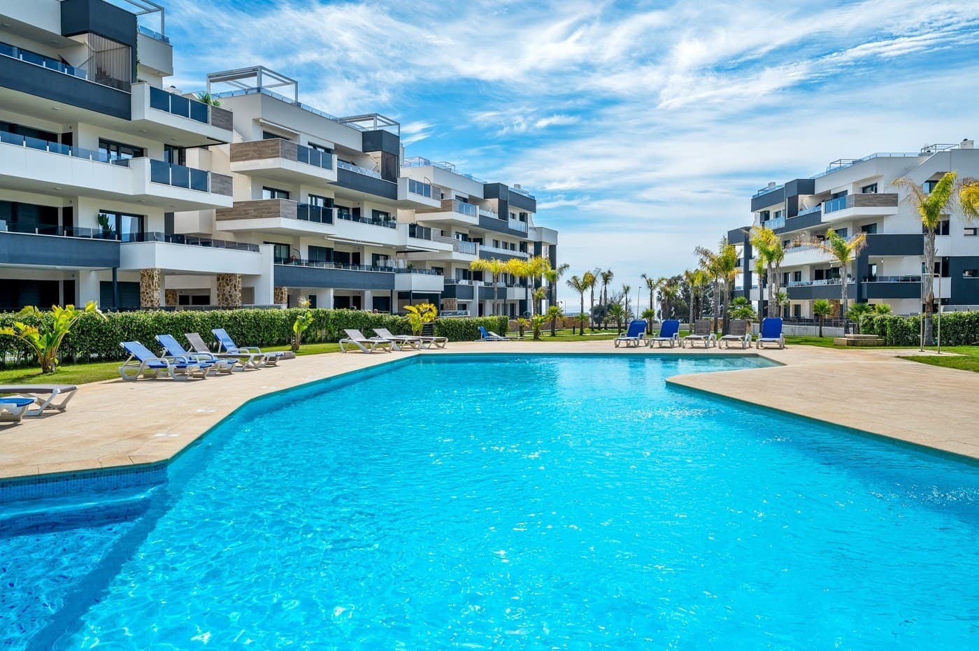 Playa Flamenca — Sea Views, Style & Sophistication

Dreaming of waking up to sea views, just a short stroll from the beach?

This luxurious, nearly-new apartment in the heart of Playa Flamenca (Orihuela Costa) offers the ultimate Mediterranean lifestyle — perfect for relaxing getaways, lucrative rentals, or a stylish permanent residence.

Why This apartment Stands Out

2 Spacious Bedrooms + 2 Sleek Bathrooms

Modern comfort with high-end finishes, ideal for couples, families, or hosting guests.

As Good As New

Built just 1 year ago, meticulously maintained and presented in pristine condition.

Fully Furnished & Move-In Ready

Step inside and start living, every detail has been taken care of.

Integrated Air Conditioning

Perfect indoor climate control, cool in summer, cozy in winter.

Electric Sunscreen

Enjoy shade or sun while admiring spectacular sea views from your private terrace.

Underground Parking + Private Storage

Secure, convenient and practical, no need to worry about where to park or store your beach gear.

Lift Access

Comfort and ease, especially for luggage or shopping days.

Resort-Style Living, Every Day

Tropical Gardens + Large Communal Pool

Relax in paradise, swim, sunbathe, or enjoy a quiet moment surrounded by lush greenery.

Wellness Area & Gym

Stay fit and unwind with wellness facilities right at your doorstep.

BBQ Zone & Playground

Perfect for social evenings with friends and family.

Serene Fountain + 24/7 Security

Peace of mind and tranquility in a secure, gated environment.

Prime Location — Walk to Everything

Just a short distance from your apartment, you’ll find Zenia Boulevard, the largest and most vibrant shopping center in the region.

Filled with over 150 shops, international fashion brands, restaurants, cafés, a bowling alley, kids' play areas, and even live music events, it’s the beating heart of the Costa Blanca lifestyle.

Need daily groceries or fresh bread?

You’re just minutes from several supermarkets as Lidl or Mercadona, local bakeries, and cozy cafés. All within walking distance, making every day effortless.

And let’s not forget, the golden sands of Playa Flamenca beach are just 950 meters away. Morning swims or sunset strolls? They’re part of your new daily routine.

Your Coastal Dream Starts Here

This exclusive apartment truly offers the best of Costa Blanca living, a perfect blend of luxury, location, and lifestyle. Whether you're looking for a permanent residence, a high-end holiday home, or a premium rental investment, this is a rare opportunity not to be missed.

Contact us today for a private viewing or more information, homes like this don’t stay on the market for long.