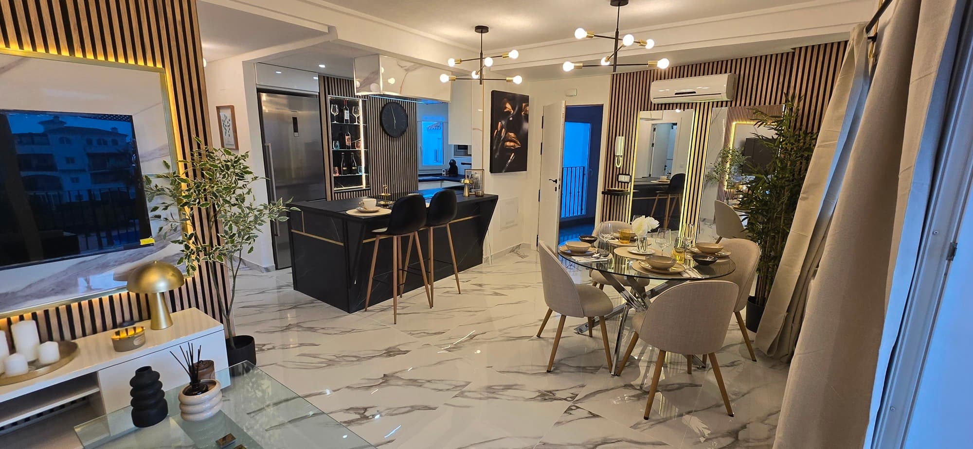 Fully renovated apartment in Hacienda Riquelme Golf ResortDiscover this exclusive, fully modernised high-end design apartment on the second floor, perfectly located close to the clubhouse of the prestigious Hacienda Riquelme Golf Resort in Murcia. This is a unique opportunity for those seeking luxury, comfort, and a truly turnkey home finished to the highest standard.This stunning apartment has been completely transformed. From the stylish new flooring to the fully redesigned open-plan kitchen, the elegant contemporary bathroom, and the refined finishes throughout — every detail exudes quality and sophistication.The bright, open-plan living room features a custom media wall and large sliding doors that lead to a west-facing terrace overlooking the pool. The new designer kitchen is fully equipped with high-quality appliances. Both double bedrooms offer fitted wardrobes, ceiling fans, and Juliet balconies, while the re-fitted bathroom boasts a fresh, modern look.The apartment is sold fully furnished, making it ready to move into immediately. It also includes a secure underground parking space, with lift access to all floors.If you are looking for a stylish, turnkey design apartment in a prime location — this is an absolute must-see.Interested? Send a message to Iris at iris@global-spain.com or Whatsapp : +32 499 73 55 34