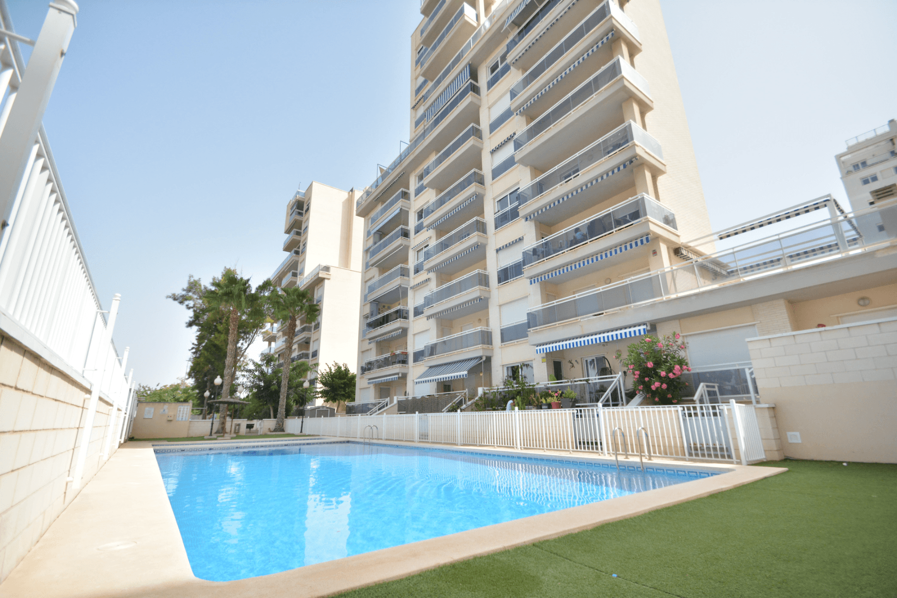 This lovely apartment is located in the SUP7 area of Guardamar del Segura, a charming seaside town on the Costa Blanca known for its long sandy beaches, natural dunes, and a relaxed Mediterranean lifestyle. The property sits within a gated residential complex made up of two apartment blocks, offering a swimming pool, open-air parking, and a playground for children.The home is on the 4th floor with elevator access and faces west, giving you open views of the Segura river and the green valley of Vega Baja that will never be blocked. With 70 m² of contracted area and 49 m² of usable space, it has been designed for both comfort and light. All rooms open onto a 10 m² terrace, which is perfect for relaxing and enjoying the excellent views. There is no interior patio, so the apartment feels bright and open throughout.Inside, you will find a furnished home with two bedrooms and one bathroom. The master bedroom includes a built-in wardrobe, and the bathroom comes with a bathtub. The kitchen is open style, fully equipped with electric appliances, and has a handy utility room nearby. The terrace is fitted with an awning for shade, and in addition to the apartment, you also have a private storage room in the basement and your own allocated parking space in the complex.The apartment has pre-installation for a ducted air conditioning system and has been very well cared for, used only as a summer residence and never rented. It is sold fully furnished, so you can move in and start enjoying it right away. Сommunal roof terrace available for all residents.The location is excellent, just 1 km from the beach and the town center, and a short drive to Alicante city and Alicante airport.This property is in very good condition and offers a fantastic opportunity to enjoy life by the sea. Taxes and purchase expenses are not included. Contact us today to arrange a viewing.