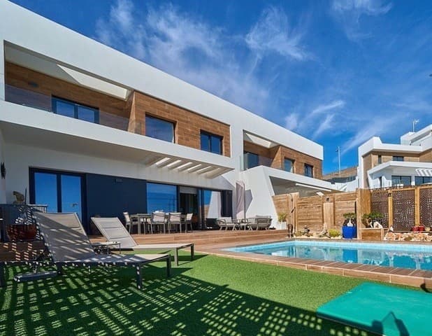 Luxury House in Beautiful Finestrat. This impressive home combines luxury, comfort and a privileged location, offering an unparalleled living experience.With a unique French-style design and high-end furniture (which can also be sold), every corner of this property exudes elegance and sophistication, making it ideal for those looking for an elegant and functional home in an exclusive and contemporary environment.The house is distributed over two floors, offering well-distributed and bright spaces. The upper floor has a bright entrance that leads to two bedrooms with en-suite bathrooms; One of them has a private balcony. The ground floor has an open kitchen fully equipped with high quality appliances, connected to a custom designed living room with direct access to the terrace, garden and private pool that can be heated in winter. Additionally, on this floor there is a third bedroom, currently used as an office, and an additional bathroom. The property has state-of-the-art equipment that includes air conditioning (hot, cold), armored door, double glazing and electric shutters and alarm system. A private parking space on the same land for one car with an electric gate and this space is protected by an awning to protect the car from the heat.The area is safe and offers easy street parking.Located in the exclusive area of &8203;&8203;Balcón de Finestrat - Terra Marina, in Finestrat. Southeast orientation, which will allow you to make the most of the Mediterranean sun throughout the day. Other photos can be sent to you without any problem upon request.