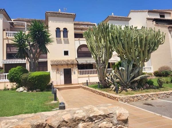 Discover your new home in the exclusive area of Los Narejos, in Los Alcázares! This stunning apartment, located on the top floor of the building, offers a unique living experience just 100 meters from Las Palmeras Beach. Enjoy a privileged setting surrounded by gardens, villas, and luxury apartments, with a magnificent 10 km beachfront promenade right at your doorstep.The apartment features 70 m² of built area and 66 m² of usable space, distributed into two bright, exterior-facing bedrooms. The master bedroom is a suite with an en-suite bathroom and a walk-in closet, while the second bedroom includes two single beds and a built-in wardrobe. Additionally, the property has a guest toilet with a shower and a full bathroom with a bathtub.The kitchen is equipped with a modern open bar that connects to the dining area and the living room, which has direct access to a terrace with stunning views of the gardens and the promenade leading to the beach. For your convenience, the apartment comes fully furnished, with a new boiler and appliances.This property also includes a storage room and an independent solarium, perfect for enjoying the Mediterranean sun. A private parking space right in front of the building adds extra convenience.Don't miss this unique opportunity in a residential area that has it all. Come visit and fall in love with your future home!