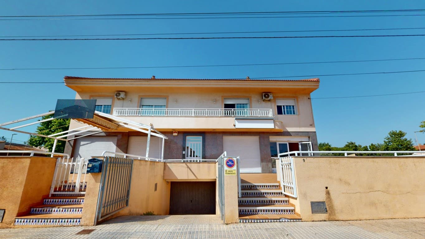 Just 400 meters from the beautiful beaches of the Mar Menor in Los Narejos, you’ll find this unique and versatile property offering a rare combination of living comfort, commercial space, and a prime location. This semi-detached building, situated next to a peaceful park, is perfect for those seeking space, flexibility, and the relaxed lifestyle of the Spanish coast.On the ground floor, there is a large commercial space featuring two wide display windows and a spacious front terrace. This area is ideal for running a business, whether it’s a shop, office, or hospitality venue, and its location—close to the beach and in a vibrant neighborhood—ensures excellent visibility and accessibility.The first floor houses a spacious and well-maintained apartment in excellent condition. The bright living room opens onto balconies at both the front and rear of the building. The fully equipped kitchen, three generous bedrooms, and a neat, functional bathroom offer everything needed for comfortable living. Air conditioning is installed in the living room and in one of the bedrooms.A staircase in the living area leads to the second floor, where you’ll find a charming studio apartment. This upper level includes a separate bedroom, bathroom, and storage room, along with a large terrace that’s perfect for enjoying the sun and views. Air conditioning is also available on this floor for added comfort.An additional highlight is the underground garage, with space for at least two to three vehicles. There is also a large, secure storage room—ideal for extra belongings or even a workshop.With its generous layout, flexible use, and exceptional location, this property is a true opportunity. Whether you’re looking to combine living and working, invest in a high-potential asset, or simply find a spacious home by the sea, this property has it all. Don’t miss out—contact us today to schedule a viewing.