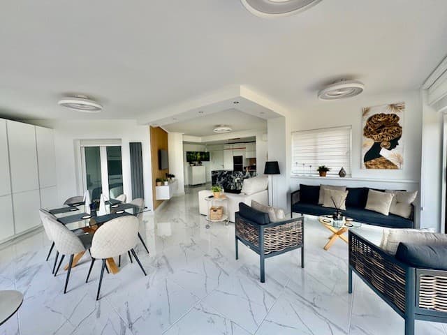Stunning Ground Floor 2 bed 2 bath Apartment. This spectacular, fully refurbished, 2 bed 2 bath South facing ground floor apartment is situated on the Jack Nicklaus designed gated community of Hacienda Riquelme golf resort with 24 hour security and a few minutes drive to the local town of Sucina with plenty of local shops and bar/restaurants on offerThis truly is a stunning property which lends itself to being the perfect permanent, or second home.On entering the property you are greeted by a completely open plan floor concept with upgraded fully tiled modern floors and upgarded white doors throughout.To your left is a fully fitted top of the range bespoke kitchen, comprising a selection of white, wall and base units. Integrated high quality appliances include fridge/freeezer, washing machine, dishwasher, double ovens and counter hob with built in extractor.The fabulous breakfast bar/counter is finished in quality graniteThere is a totally expansive living and dining area that has spaces designated for lounging, seating and dining. Complete with air conditioning, the living/dining area has modern ceiling fan lights fitted throughout, three sets of sliding glass doors fitted with night and day blinds which give amazing views out onto the terrace and golf course, and flood the room with natural light, a modern feature cladded tv wall, anthracite vertical modern radiator, and addidional white and glass storage cupboards.Leading out from the longe/diner is a newly tiled south facing terrace the ideal space to relax, read a book or enjoy a coffee.The master bedroom has floor to ceiling fitted white wardrobes, air-conditioning, anthracite radiator, modern ceiling fan light and patio doors.The second double bedroom benefits from a fully tiled en suite, comprising walk-in shower, vanity unit and basin, led lit mirror and toilet, fitted white wardrobe, anthracite radiator and a modern ceiling fan lightThe luxury main fully tiled bathroom has a large walk-in shower, vanity, led lit mirror and toilet and modern towel rail.The apartment comes with an underground assigned parking space with a private storage unit.This stunning apartment is been sold fully furnished and we highly recommend a viewing to appreciate how amazing this property is.Around the corner is one of the 19 communal swimming pools and is just a short walk to the on site restaurant and supermarket.Murcia International airport is a 15 minute driveAlicante airport is a 55 minute drive.Ideally situated to explore all the Costa Calida has to offer including the ancient towns of Cartagena and Murcia and a short drive to the stunning beaches of the Mar Menor.
