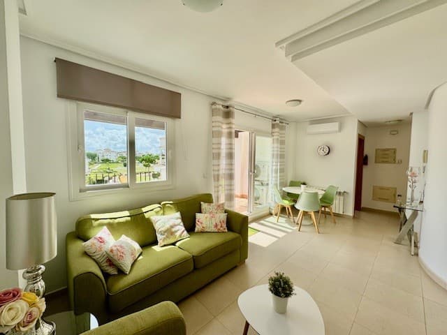 Second Floor Curved wall Golf Apartment. We are delighted to offer for sale this stunning 2 bed 1 bath popular curved wall designed apartment.This WEST facing apartment, has stunning views out over one of the 19 communal pools and the Jack Nicklaus designed golf course. Hacienda Riquelme golf resort is a gated community with 24 hour security, on site restaurant, supermarket, golf shop, paddle and tennis courts. Only a few minutes drive from the local village of Sucina with plenty of ameneties, shops and restaurant/bars on offer. Ideally situated to explore all the Costa Calida has to offer including the fantastic beaches of the Mar Menor or the ancient towns of Cartagena or Murcia.Entering this lovely apartment to the right is the large fully fitted kitchen with modern wall and base cabinets, complete with fridge freezer, washing machine, oven and hob, dishwasher and a window overlooking the communal pool.The curved wall, light filled, large living dining room has patio doors leading out to the large tiled terrace with fantastic views of the golf course, and pool. the ideal place to enjoy those winter or summer days with all day sun, ideal for relaxing or dining.The two good sized double bedrooms benefit from sliding wardrobes, air conditioning, radiator and patio doors that both lead out onto a lovely terrace, with stunning views over the communal gardens and mountains, perfect to enjoy your morning coffeeThe family fully tiled bathroom benefits from an upgraded walk-in shower, vanity unit and basin, mirror and toiletThis apartment comes with an underground private secure parking space accessed by remote contol.This will make an ideal permanent home or superb holiday home.This apartment is been sold fully furnished apart from personal iems.Murcia Airport is a 20 minute driveAlicante airport is a 55 minute drive