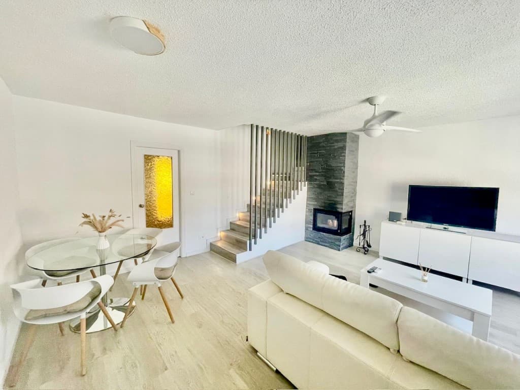 Charming 4-Bedroom, 2-Bathroom Townhouse in Calabardina, Murcia. **MOTIVATED SELLER**This delightful townhouse is nestled in the picturesque coastal town of Calabardina, Murcia. This property is perfect for families or investors looking for a vacation rental opportunity. There are four well-appointed bedrooms on the first floor, including three spacious double bedrooms with built-in wardrobes and one cozy single bedroom.The double bedrooms include:o One double bedroom with two single beds.o Two king-size bedrooms for a luxurious night's sleep.o A single bedroom with a divan bed that converts into a king-size bed, ideal for accommodating extra guests.The property boasts two modern bathrooms equipped with walk-in showers, with one located upstairs and the other downstairs for convenience.The 30 sqm north-facing lounge that seamlessly blends with a dining area, featuring a modern log burner for warmth during the cooler months. Additional cooling comes from an A/C unit and ceiling fan, ensuring a comfortable environment year-round.The fully equipped kitchen that opens onto a spacious 20 sqm terrace, ideal for family gatherings, complete with a stone barbecue for outdoor cooking.In addition there is a 16 sqm terrace on the north side, providing a cooler dining option during the summer.A delightful 20 sqm rooftop terrace that boasts breathtaking views of the sea and mountains. This inviting space features installed solar panels for energy efficiency, complemented by a convenient storage room for all your needs.The property includes a private underground garage (approx. 40 sqm) with direct access to the house via internal stairs.There is a communal pool.The townhouse is conveniently located just a 2-minute walk from the beach and within a 5-10 minute walk to local bars, restaurants, pharmacies, and supermarkets.The main town of Águilas is only a 10-minute drive awayThe property has been successfully operated as an Airbnb during summer season, It has also been rented out long term during low season.The sale includes the existing tourist license, allowing for a seamless transition for the new owner to continue the vacation rental business if required.Viewing is highly recommended to appreciate all this property has to offer.