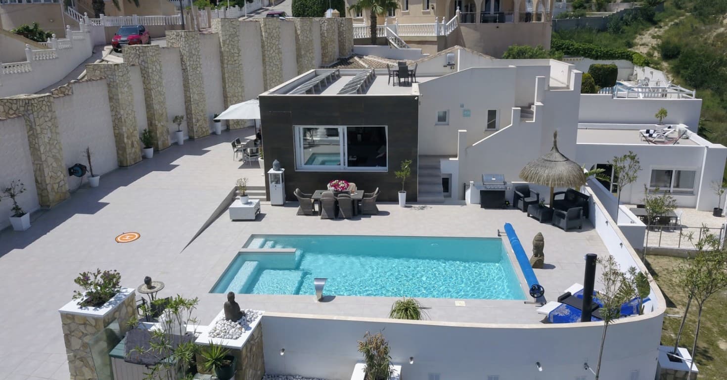 This beautiful modern build villa have also 2 apartments and a studio!Is in Ciudad Quesada and built on a plot of 1000 m² and consists of 3 buildings. The main building comprises a house with a 70m² living / dining room, open kitchen with island, 2 large bedrooms, and 2 en suite bathrooms, and a roof terrace of 120 m².At the rear is a separate apartment of 60 m² with living room, kitchenette, 2 bedrooms and 1 bathroom.In a separate building there is a studio consisting of 1 bedroom and 1 bathroom.In another separate building there is a multifunctional space with 1 bedroom and 1 bathroom, currently used as an office space, but can be modified into residential or storage space.Large partially tiled garden with automatic gate, private pool and large parking space.From the roof terrace, the house offers a view over the valley and distant sea.The house is equipped with camera surveillance.Perfect for a B&B .