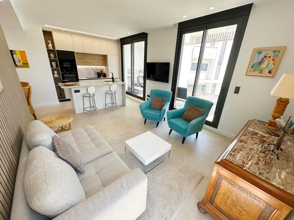 No need to wait for this property as it is a KEYREADY resale...We are excited to offer this beautiful resale two bedroom two bathroom second floor apartment located on the luxurious Santa Rosalia Lake and Life Resort which boasts a large crystal Lagoon, beach club, stylish clubhouse, adventure golf and sports facilities just 5 km to the beaches of Los Alcazares.No need to wait for your property to be built as this is a resale and comes furnished ( excluding the sideboard and patio furniture) with vented AC. On entering the property the lounge kitchen diner is to your left and comes with an island and patio doors to the south facing sunny terrace which has great views over the orange groves. There are two double bedrooms with fitted wardrobes. One bedroom has an ensuite and there is a further bathroom which could easily be made into an ensuite by adding a door in the hallway. There is a useful cupboard in the hall which houses the boiler and the washing machine. This apartment comes with covered parking and a storeroom and there is a community pool which is heated so can use all year round. The owner has all the permits in place for rental.Contact us to arrange to view this beautiful apartment, we would love to hear from you