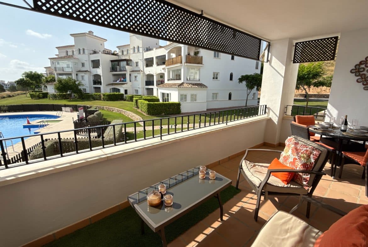 Discover this beautifully designed 2 bedroom apartment for sale at the prestigious Hacienda Riquelme Golf Resort in Murcia, Spain. This golf property features a unique curved wall design, a large modern kitchen with new appliances, and a spacious private terrace offering panoramic pool and golf course views. Perfect for retirees or holiday home seekers looking for apartments with golf views in Murcia, this property combines bright, airy interiors with an unbeatable resort location.Located just 20 minutes from the Costa Cálida beaches and Murcia city, and only 3km from the charming town of Sucina, this Murcia golf resort real estate opportunity is ideal for those seeking a tranquil lifestyle with easy access to local attractions. Enjoy secure, gated community living with exceptional resort amenities, including communal pools, landscaped gardens, and 24-hour security.Highlights:2 bedroom apartment, 1 large bathroomModern kitchen, dual-aspect terracesPanoramic golf & pool viewsSecure gated community€134,950If you’re searching for a golf property for sale in Spain or a retirement property in Murcia, don’t miss this rare chance to own a standout apartment at Hacienda Riquelme Golf Resort.