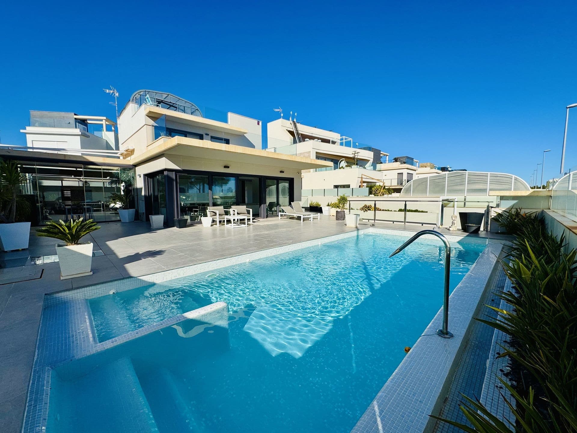 VILLA IN SPAIN WITH SEA VIEWS!. Luxury 3-Bedroom Villa with Private Heated Pool and Stunning Amenities! Discover the perfect blend of comfort, elegance, and modern living with this exquisite three-bedroom, three-bathroom villa spread across three thoughtfully designed floors. Ideal for those seeking both luxury and practicality, this villa offers everything you need to move in and start living in style.Spacious Living Areas: The villa boasts a large main bedroom with an en-suite shower and toilet on the ground floor, a comfortable living room, and a fully equipped kitchen. The kitchen includes everything you need, making this home truly turnkey.  Additional Bedrooms & Bathrooms: This home offers plenty of space for family and guests, with two more bedrooms on the first and second floors and an additional bathroom.  Enjoy a saltwater, bleach-free heated swimming pool with a filtration system, perfect for relaxation and exercise year-round.  Experience year-round comfort with heated floors throughout the villa, adding a touch of luxury to your living experience.  Behind the villa, you’ll find a private mini garden, pantry, and a dedicated area for sports and recreation, offering plenty of opportunities for outdoor enjoyment.  The second floor features a cosy movie-watching lounge and a convenient washing machine.  The third floor is your personal sanctuary, with a relaxation area and a luxurious jacuzzi, perfect for unwinding after a long day.  The villa is being sold fully furnished with everything inside, so you can move in immediately and begin enjoying the luxurious lifestyle it offers.  Whether you are looking for a family home, a private retreat, or a stunning entertainment place, this villa offers the ultimate luxury living. Contact us today to schedule a private tour!
