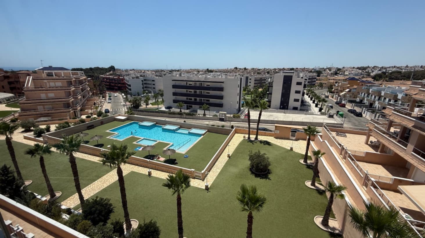 Luxurious Coastal LivingWelcome to your new haven, a stunning penthouse nestled in the vibrant Costa Blanca Sur area of Orihuela, Alicante. This contemporary living space effortlessly combines modern elegance with breathtaking views, making it a true jewel on the Mediterranean coastline.Spacious and Inviting LayoutWith a generous built area of 98 square meters, this penthouse features three well-appointed bedrooms and two stylish bathrooms. The open-plan design invites natural light to flow through the space, creating an airy and uplifting atmosphere perfect for relaxation and entertainment.Impressive Outdoor TerraceStep outside to discover an expansive terrace of 100 square meters, ideal for alfresco dining, morning coffee, or soaking up the warm Mediterranean sun. Whether you are hosting gatherings with friends or enjoying quiet evenings under the stars, this private outdoor oasis is perfect for making beautiful memories.Modern ComfortsThis penthouse is equipped with modern amenities, including air conditioning to ensure year-round comfort. The open kitchen design complements the lifestyle of convenience and sociability, allowing you to engage with family and guests while preparing meals.Community AmenitiesThe community offers a welcoming swimming pool, perfect for those hot summer days. Imagine spending your afternoons lounging by the pool, basking in the sun, and enjoying the vibrant social atmosphere blossoming around you.Additional FeaturesThis property boasts a host of advantages, including double-glazed windows that enhance energy efficiency and noise reduction. The penthouse comes furnished, allowing you to move in with ease and start your new lifestyle immediately. Additionally, convenient parking ensures you have a dedicated space for your vehicle.Your Slice of Paradise AwaitsSituated in one of Spain’s most enchanting coastal regions, this penthouse offers the perfect blend of luxury, comfort, and leisure. Bask in the Mediterranean lifestyle while enjoying convenient access to local shops, restaurants, and stunning beaches. This is more than just a home; it’s a sanctuary where you can truly live your best life.
