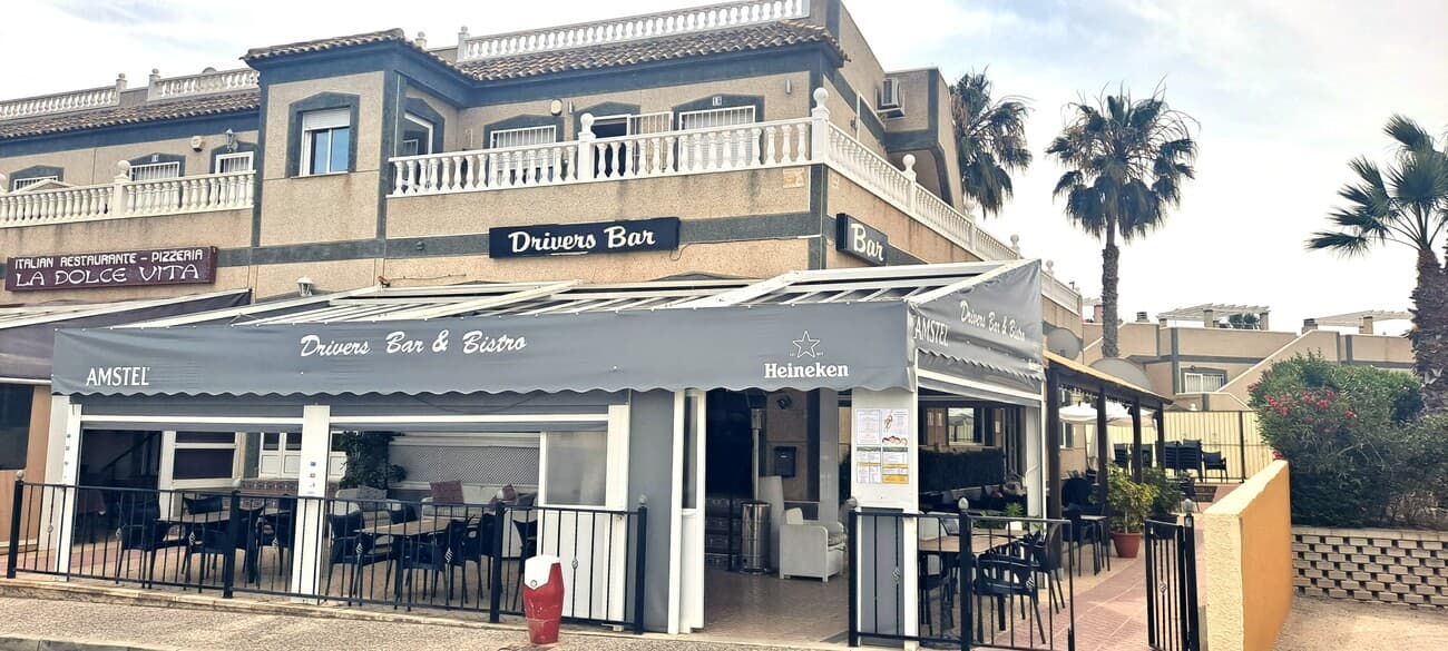 Fantastic opportunity to acquire this thriving business! This well established restaurant and bar with long standing customers is offering an excellent business opportunity within catering and hospitality in the heart of the vibrant commercial area of Villamartin.The business sale includes all furniture fixtures and fittings as well as existing stock. The business comes with a fully equipped kitchen, white goods and added storeroom.This popular bar & restaurant has successfully operated for over the past 10 years and it is in a great location with excellent seating areas for up to 130 seats both indoor as well as the large sunny outdoor terraces. The current owners have built an excellent reputation for quality of food and service with with ever popular Sunday lunch and varied menu proving very popular for both local residents as well as visitors to the area. The bar hosts regular entertainment, a pool league, golf society as well as private functions- Located close to numerous other bars, shops and businesses near to the Villamartin central area. The purchase price is for the business transfer only or ´Traspaso´ (not ownership of the building which attracts a monthly rental to the landlord). A structured handover plan is available for the prospective buyers and great potential to develop the business further. ** Viewings strictly by appointment only ** Contact our team today for further information 