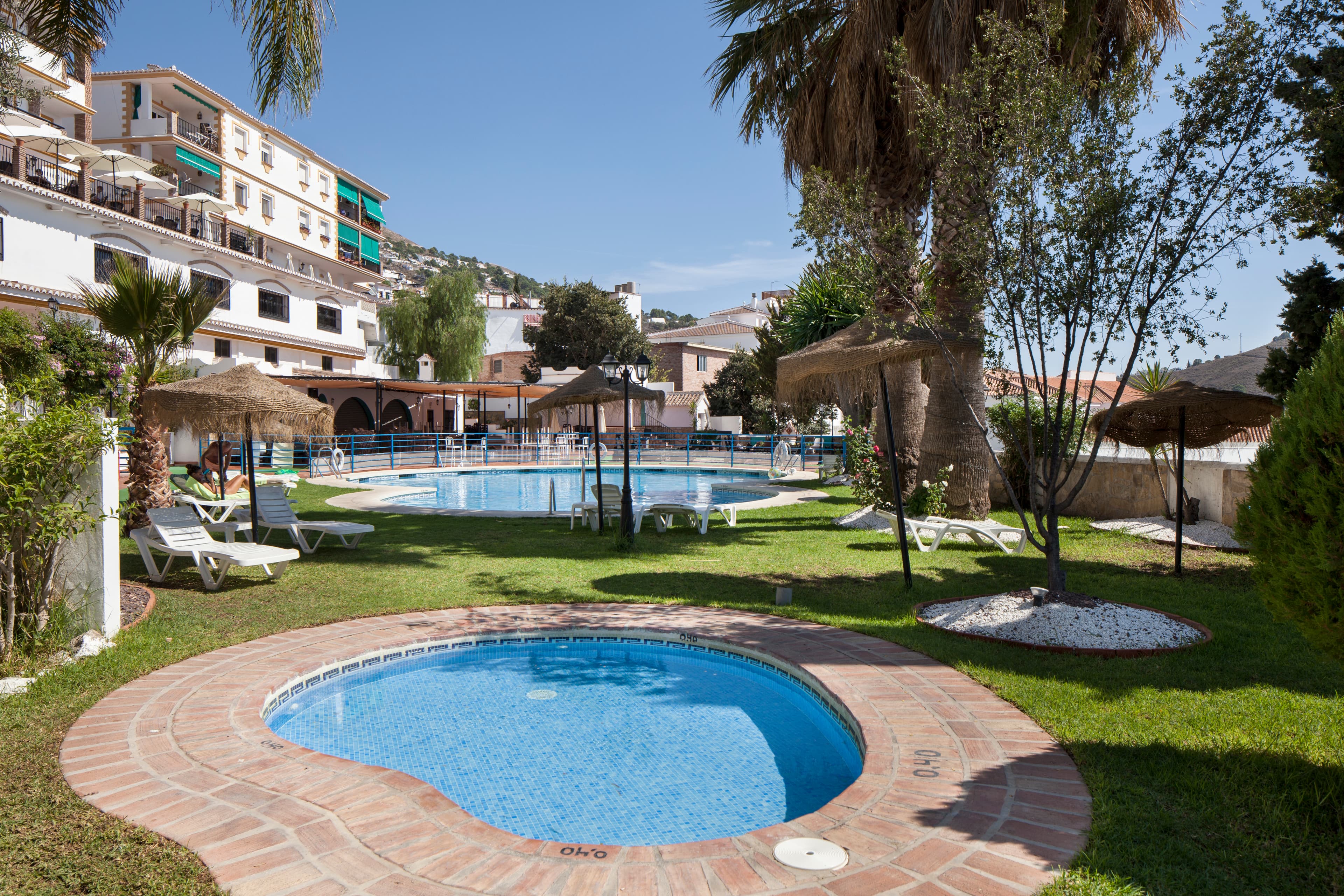 A fabulous family-run hotel with 32 rooms and 4 self-contained bungalows, and private accommodation is situated in the most fantastic village of Axarquia area, with a lively natural village and surrounded by the most beautiful Natural Park and has amazing sea views. Located only 20 min drive from the beach and within 50 min drive to the airport.With a unique enclave and situated among the beautiful white houses, you will find the hotel that offers all the accommodation and comfort to its visitors. Hotel and the bungalows are complemented by an a la carte restaurant, cafeteria, swimming pool, tennis court, free parking for its customers and a large event/meeting room. This well run hotel offers so much tranquillity and comfort in the most fantastic location, which also offers a unique energy that gives guest the best feeling of staying in this hotel and this amazing area.* 34 rooms* 80 personer restaurant* 70 personer, cafeteria of bar* Lounge area with wifi by pool area* Outdoor bar and catering facili.* Covered pool and chill out area* Outside dinner area* Outside terrace basement; stage, bar, toilet* Reception* Office* Laundry room* First aid room* Garden, private parking, tennis court* Lift* Handicap pool area, toilet and access* Pool and children pool* Solar panels* Tv,sat, wifi, safebox, phone service* Heating: aircon central* Balconies with seaviews* 4 semi-detached bungalows, self-contained* Private area with double bedroom, bathroom, living room, kitchenette.