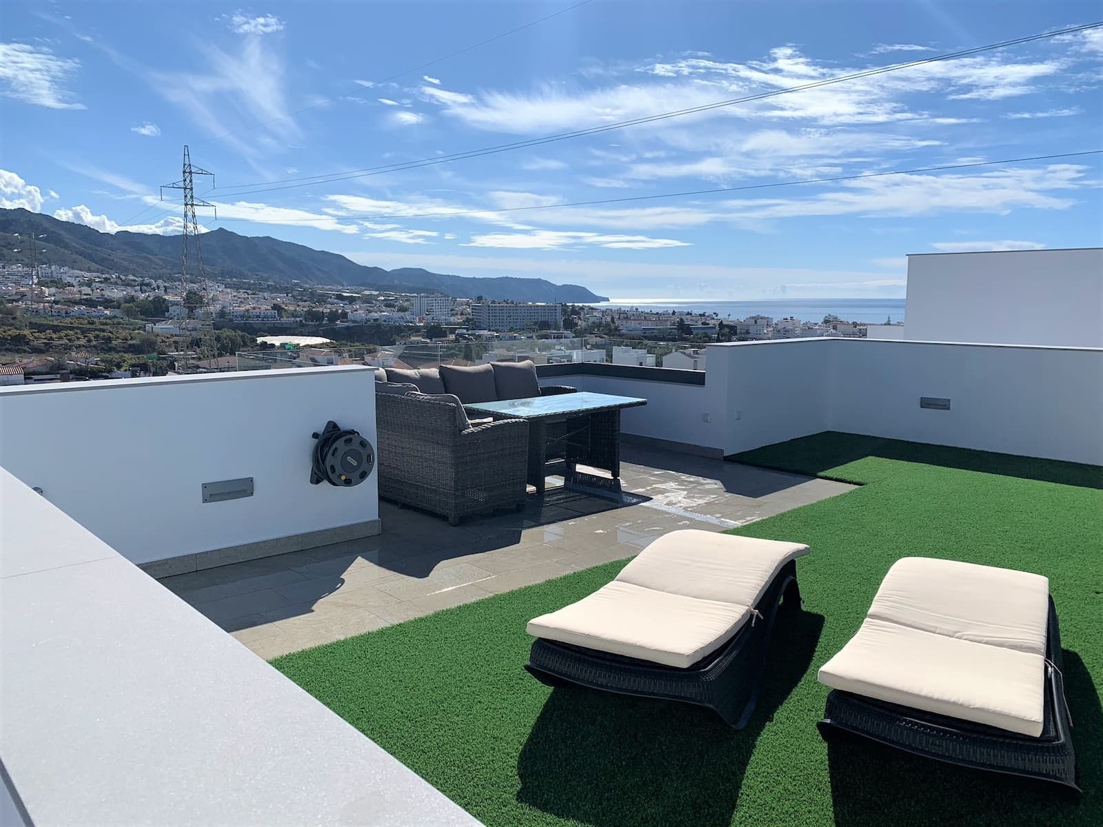 Luxurious and elegant pool villa in Nerja As a novelty this autumn we present this luxury property for sale in Nerja. Located in the exclusive area of La Exotica. Detached, modern house, built with excellent quality materials and with spectacular views from all parts of the house. All glass windows are from floor to ceiling, giving plenty of light and great views from all rooms.The house is distributed over three levels for living, as well as a lovely large terrace at the top with stunning views of the surrounding mountains and the Mediterranean Sea. A spacious hallway welcomes you as you enter the property, to the right are the stairs leading to the lower and upper floors. Entering on the left we find a large and luxurious open plan living room, fully equipped kitchen with kitchen island and dining area. Here there is plenty of space for rest and relaxation, with access both to the pool area and to the terrace overlooking the sea and the village of Nerja. On the ground floor is the first bedroom together with a bathroom, from the bedroom you also have access to the pool area. The pool area offers a cooling pool and a lovely terrace for sunbathing, when hunger strikes you are close to the kitchen or you can make a nice barbecue. The pool area is designed to be the oasis and center of the house, where you can access it from all parts of this floor.We take the stairs up to the next level and to the right we enter a bedroom en-suite, with a private balcony and nice views of the sea and sunset. To the left of the stairs is another bedroom en-suite, with a walk-in-closet and large windows with a French balcony that gives you the sunrise over the sea. Extending that bedroom is another bedroom, currently used as a children's room. There is also a bathroom with a Jacuzzi bathtub and beautiful glass windows to let in the light, a great place to relax. In the hallway off these three bedrooms, are large built-in wardrobes with sliding doors. Here we also have the exit to the house's large sun terrace, where you can enjoy 360° views of the Mediterranean Sea, the Almijara Mountains and the centre of Nerja. The obvious place to lie and sunbathe during the day, and later spend the summer evenings enjoying the sunset and the balmy breeze.We make our way down to the basement floor, where we first find the laundry room. There is also a large bedroom en-suite, which is currently used as an office and as storage space. There is also a large garage with storage room and space for two cars, the current owner also has a gym there. Adjacent to the garage is a further bedroom en-suite, this is currently used as a games room. All doors are fitted with security sensors, alarms, video surveillance and lighting systems and air conditioning. You will undoubtedly love this spectacular house, with an exclusive design and made of high quality materials. Must see!!