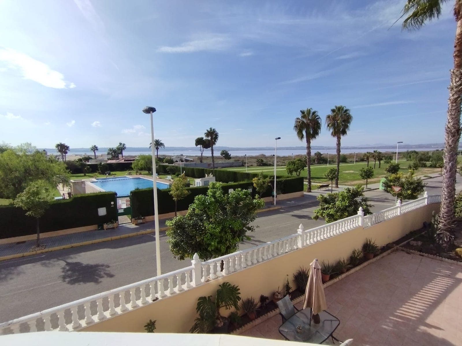 Magnificent Villa with Breathtaking Location in Torrevieja Overlooking the Salt Lakes and Mountains Welcome to this impressive and spacious villa located in Torrevieja with spectacular views over the salt lakes and mountains. The villa has access to a large communal pool. This large villa offers a generous 375 m2 and is ideal for a large family or as a luxurious holiday home. Spread across 2 floors and a spacious basement, the house boasts 6 large bedrooms, 5 bathrooms, a living room, dining room, and a large kitchen-dining area connected to the living room and the villa's laundry room. The kitchen is well-equipped with tiles on all the walls and has an open connection to one of the courtyards. There is also a large double bedroom on the ground floor. On the first floor, you'll find 5 bedrooms, including the master bedroom with a jacuzzi and walk-in closet. Wake up to the stunning views over the salt lakes and mountains from the spacious master bedroom. There is also another large bathroom with a jacuzzi on this floor. All bedrooms in the villa have built-in closets. The basement, which spans an impressive 135 m2, contains 2 rooms and a bathroom with high ceilings. On the second floor, there is a loft area with access to the large rooftop terrace, offering a unique 360-degree view. Enjoy Costa Blanca's many hours of sunshine and an impressive sunset from the rooftop terrace. The villa is situated in a quiet area close to nature. The impressive 600 m2 plot is tiled and easy to maintain. The garden features several terrace areas and garden spaces, with the possibility of installing a private pool on the plot. This villa is truly something special with its fantastic location, ample rooms, and large plot. A rare opportunity to acquire this Mediterranean gem.