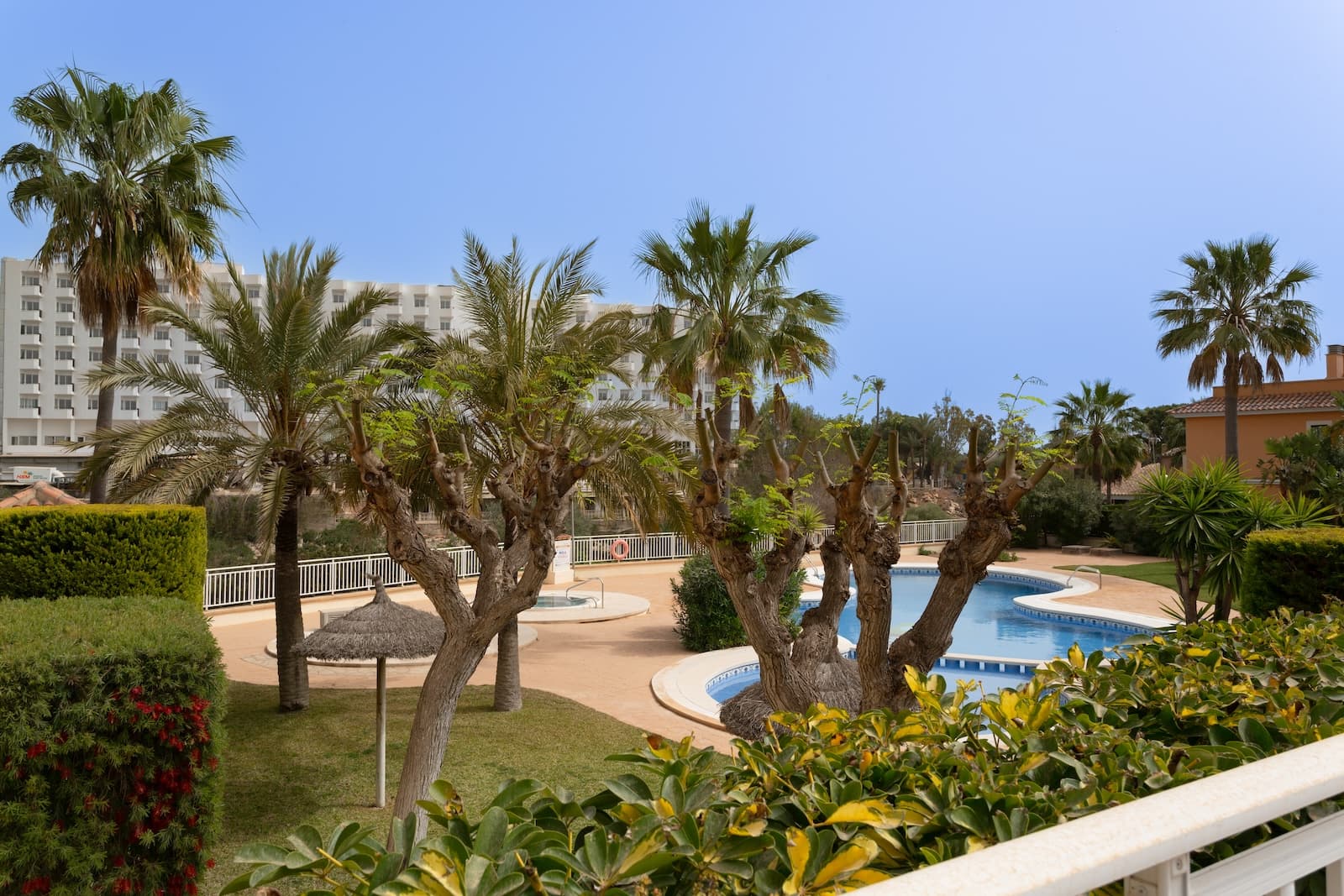 Apartment with Private Rooftop and Pool Area – Mirador des Calles, Calas de MallorcaThis apartment in the sought-after community Mirador des Calles offers 80 m² of living space with an open-plan kitchen, dining, and living area, and direct access to a private 13 m² front terrace. Total built area: 93 m².In addition, there is a spectacular private rooftop terrace of 69 m² – altogether 82 m² of terraces – featuring an outdoor shower, green views, and plenty of untapped potential. Here you could create a truly unique rooftop experience with an outdoor kitchen, chill-out lounge, or dining area.LayoutBright living/dining room with large sliding doors opening onto the front terrace (double glazing)2 bedrooms on the main floor, one with ensuite bathroom and bathtubAdditional upstairs room, ideal as a small bedroom, office, or storageSecond bathroom in good conditionPrivate parking space includedCommunityMirador des Calles is a well-run community with a large and secure communal pool area, which can be accessed directly from the apartment without needing to go out on the street. The community has also recently approved a major refurbishment project: all façades will be repainted in the coming year, giving the complex a fresh and attractive new look.Condition & PotentialThe apartment is sold furnished and remains in its original condition since purchase. While generally well-kept, a renovation, fresh paint, and modern upgrades would significantly enhance both comfort and value – especially considering the exceptional size of the rooftop terrace.Highlights80 m² living space + 13 m² front terrace69 m² private rooftop with outdoor showerTotal: 93 m² built + 82 m² terraces3 rooms, 2 bathrooms (one ensuite)Private parkingDirect access to large communal pool areaWell-maintained community with upcoming exterior renovationsCalles de Mallorca – A Peaceful Coastal Gem on MallorcaCalles de Mallorca is a charming and tranquil town on the beautiful island of Mallorca. Surrounded by stunning natural scenery, the area offers a relaxed atmosphere with breathtaking views of the sea and the surrounding landscape. With close proximity to beautiful beaches, local restaurants, and nature trails, it is an ideal destination for those seeking peace and authentic Mallorcan charm. Perfect for both year-round residents and holidaymakers looking to enjoy the best of Mediterranean living.