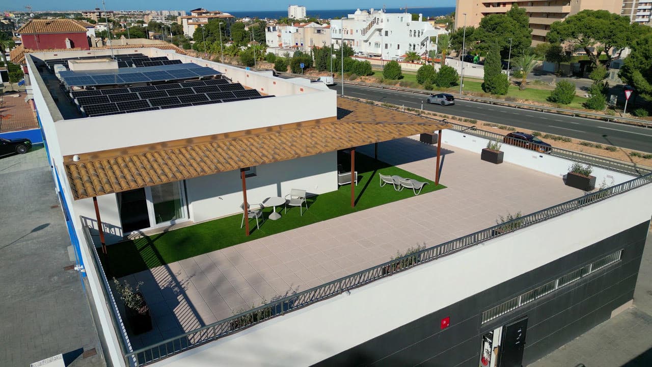 Discover this stunning newly built apartment located right in the heart of La Zenia (Orihuela Costa).A truly unique home distinguished by its privacy, design, and top-quality finishes — just a few minutes from the beach and the popular La Zenia Boulevard shopping center.Situated on the first and only floor of a building with just two homes, this apartment offers the peace of a penthouse — with no upstairs neighbors — and the comfort of an exclusive, private setting.Property Features:Built area: 122 m²Private terrace: 250 m²Bedrooms: 3Bathrooms: 3 (including one en-suite)Floor: 1st, exteriorBuilding with lift (only two owners)Year: New constructionAir conditioning via ducts + blue-heat radiatorsSchüco PVC windows and security door with code or key accessFully furnished and ready to move inValid tourist licenseThe apartment has been designed for outdoor living, featuring a spectacular 250 m² private terrace with a barbecue area, covered porch, artificial grass, and spacious chill-out zones — an authentic Mediterranean oasis.Inside, every detail has been carefully thought out: a designer Italian kitchen fully equipped with appliances, bright and modern living areas, and three elegant bathrooms with premium materials.Thanks to its tourist license, this property is also an excellent investment opportunity, offering high rental potential in one of the most sought-after areas of the Costa Blanca.Prime location:Just a short walk from La Zenia Beach, surrounded by restaurants, supermarkets, and all amenities, with excellent road connections to the rest of the coast.A perfect home to live in all year round, enjoy as a holiday retreat, or rent out for attractive returns.