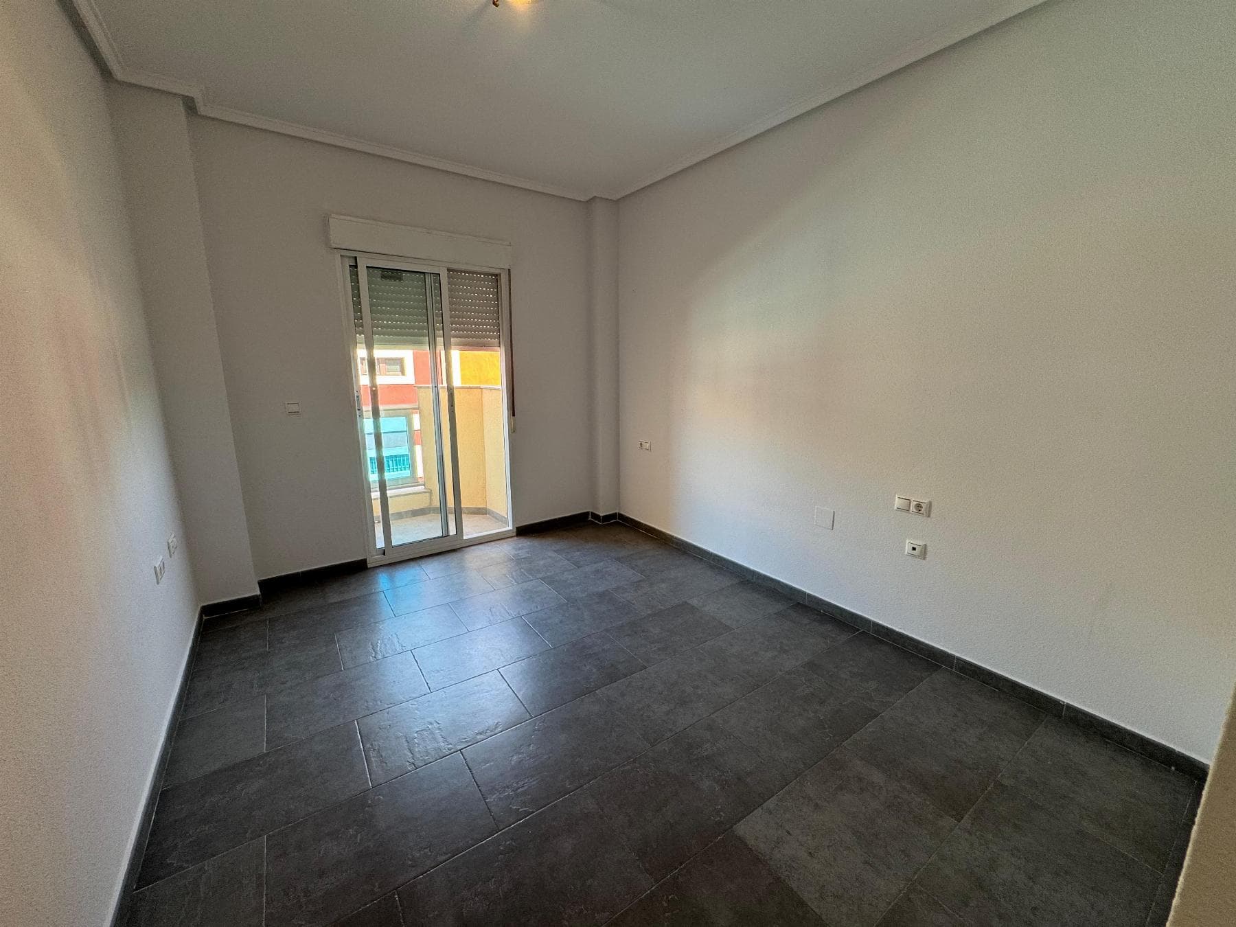 Unique opportunity! 3-bedroom, 2-bathroom apartment in the heart of Almoradí, Costa Blanca Only €106,000We present this charming apartment of approximately 106 m², located in the traditional and welcoming municipality of Almoradí, on the Costa Blanca, an area in constant growth, ideal for both primary residence and investment. For only €106,000, this property offers an excellent balance between price, quality and lifestyle.The property has 2 spacious bedrooms, 3 full bathrooms, a separate kitchen, a large and bright living-dining room, a pleasant terrace, a practical storage room and a light well that provides ventilation and natural light to the interior.Located in a strategic area of Almoradí, surrounded by supermarkets, pharmacies, bars, restaurants, shops and shopping centres, this property offers an enviable quality of life. Just 35 minutes from Alicante International Airport, Almoradí is a well-connected municipality, perfect for those seeking tranquillity without sacrificing urban amenities.Almoradí stands out for its rich traditional architecture, its central square with the majestic church of San Andrés Apóstol, and its famous Saturday market, one of the largest in the Vega Baja. In addition, it is only a 20-minute drive from the beaches of Guardamar del Segura and 25 minutes from La Mata, known for its natural park, trails, viewpoints, and its extensive beach with crystal clear waters.The area also offers a wide range of leisure and cultural options from the nearby Lagunas de La Mata and Torrevieja (30 minutes away) to golf courses such as La Finca Golf (just 10 minutes away). Almoradí is synonymous with a healthy Mediterranean climate, with over 300 days of sunshine a year and mild temperatures all year round.If you are looking for a well-located, spacious and competitively priced property on the Costa Blanca, this property in Almoradí is an ideal option for enjoying Mediterranean living.IBI €196Contact us today and discover your new home in the sun!