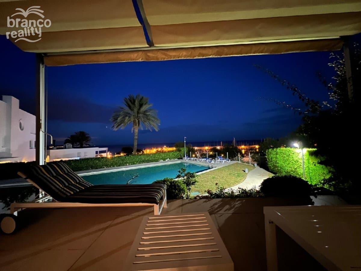 We offer an exclusive 4 bedroom, 4 bathroom terraced villa with separate toilet in the smaller, quiet resort of Torredembarra with sea views and 200m from a beautiful sandy beach. The town of Torredembarra has a population of approx. 16 thousand inhabitants, is located on the Costa Dorada, 19 km from the historic city of Tarragona and 70 km south of Barcelona International Airport with excellent air connections. The train station is less than 10 minutes' walk away, providing excellent transport links to Barcelona and the south of Spain. There are all the necessary services on site including several shops, restaurants, cafes etc.The villa was completed in 2010. It is located in a gated, smaller complex of terraced villas with its own, community large swimming pool. It is a 4 storey villa with its own elevator and underground garage for 1 car. The villa is equipped with air conditioning, solar panel water heating, alarm system, security electric blinds, interior shutters, awnings and luxury furniture. The villa is built on its own plot of 308 m2.On the 1st underground floor there is a garage with remote controlled entrance, there is also a separate, fully equipped guest apartment with a double bedroom and extra bed, fully equipped with fitted wardrobes and a full bathroom with toilet.On the ground floor there is a furnished kitchen including a fridge, oven, dishwasher, washing machine and wine cellar. There is also a living room with dining room with access to a large terrace overlooking the pool and the sea, separate toilet.On the 2nd floor there is a children's room with balcony, bathroom and another large double bedroom with separate bathroom and separate balcony.On the 3rd floor there is an apartment with a double bed, bathroom and a large terrace.The total usable area of the villa is 208 m2. The villa has several terraces and balconies.The villa is suitable for seasonal and year-round living, it is also suitable as a villa for short and long-term rentals as an investment opportunity.