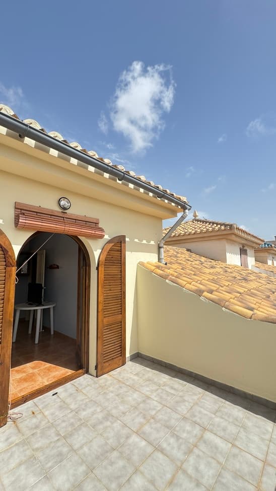 SEMI DETACHED VILLA IN LOS ALCAZARES -100 METERS FROM THE BEACHWe present this charming semi-detached chalet, ideally located in one of the most sought-after areas of Los Alcázares, just steps from the seafront promenade and the well-known Hotel 525. This property is perfect as a primary residence, holiday home, or investment opportunity, thanks to its proximity to the beach, leisure areas, shops, restaurants, and essential services.The house is distributed over three floors, offering bright, spacious, and versatile living areas.- Layout of the property:Ground Floor:Welcoming front porch with space to park a vehicleBright and spacious living-dining room, ideal for family gatheringsGuest toiletFully equipped independent kitchenPrivate back patio with storage space and plenty of potential for a chill-out area or laundry zone- First Floor:Three bright bedrooms with good layoutFull bathroom with bathtub-Second Floor:Large fourth bedroom, perfect as a master bedroom, home office or playroomDirect access to a private terrace with open viewsThe property is in good condition and ready to move in, while also offering room for modern updates or customization.Los Alcázares is a charming coastal town located in the Region of Murcia, along the calm waters of the Mar Menor. With over 300 days of sunshine per year, warm and shallow waters, safe beaches, and a relaxed, family-friendly atmosphere, it is an ideal place to live or enjoy a peaceful holiday.The town features a beautiful promenade, local markets, nearby golf courses, and excellent local cuisine—making it one of the gems of the Murcia coastline.- Driving distances:Murcia city center: 30 minutesCartagena: 25 minutesMurcia International Airport (Corvera): 30 minutesAlicante Airport (El Altet): 1 hourAlicante city: 1 hour 15 minutes 