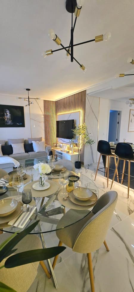 Stunning fully renovated apartment located in the luxurious Hacienda Riquelme Golf Resort, just 15 minutes from the sea and 20 minutes from the city of Murcia. This apartment offers many highlights: a spacious south-west facing terrace with views of the pool, golf course and gardens, bright bedrooms where you can enjoy breathtaking sunrises, and a large main terrace perfect for admiring the soft pink hues of the sunset.  Everything has been tastefully renovated in a modern yet warm style, and absolutely everything is brand new: Fully equipped kitchen with osmosis system, oven, induction hob, fridge, dishwasher, washing machine, and coffee machine, 3 brand new TVs still wrapped in plastic, Beds with built-in storage compartments for extra practicality.  The apartment also enjoys an ideal location within the resort, just steps away from the supermarket, restaurant, and ATM.🍽️ The restaurant serves breakfast, lunch, and dinner 365 days a year, even on Christmas Day and New Year’s Eve. The apartment is sold fully furnished and decorated, ready to move in — just bring your suitcases! 💎 A golden opportunity not to be missed! 💎 