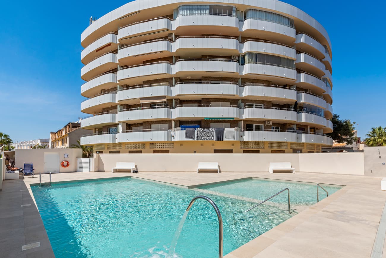 This is a fantastic opportunity to purchase a spacious and fully refurbished first floor flat that has just come on the market. Located in an outstanding location in La Zenia, just 500m from the beach on COSTA BLANCA SOUTH, this beautiful flat offers the following features:Two bedrooms and one bathroomBuilding area of approximately 70 m2South facing terrace of 10 m2Communal parking spaceLarge communal pool500m from the seaHere is the overview of this fantastic flat. As you enter, you have a large open space with beautiful kitchen, with a dining and lounge area. With two spacious bedrooms with built-in wardrobes and a well-equipped bathroom, this flat offers a lovely home for anyone looking for a flat in a great location within walking distance of the beach. You have access to gated communal parking, which is a definite plus in this location. This fantastic apartment has a large south-east facing terrace with sea views. This is a fantastic opportunity to buy a spacious AND fully renovated flat at a great price, which is just a short walk from the beach, a selection of local restaurants, shops, bars, within walking distance of La Zenia Shopping Centre and a short drive from several golf courses.Contact us soon to arrange your private viewing.Thanks for looking!