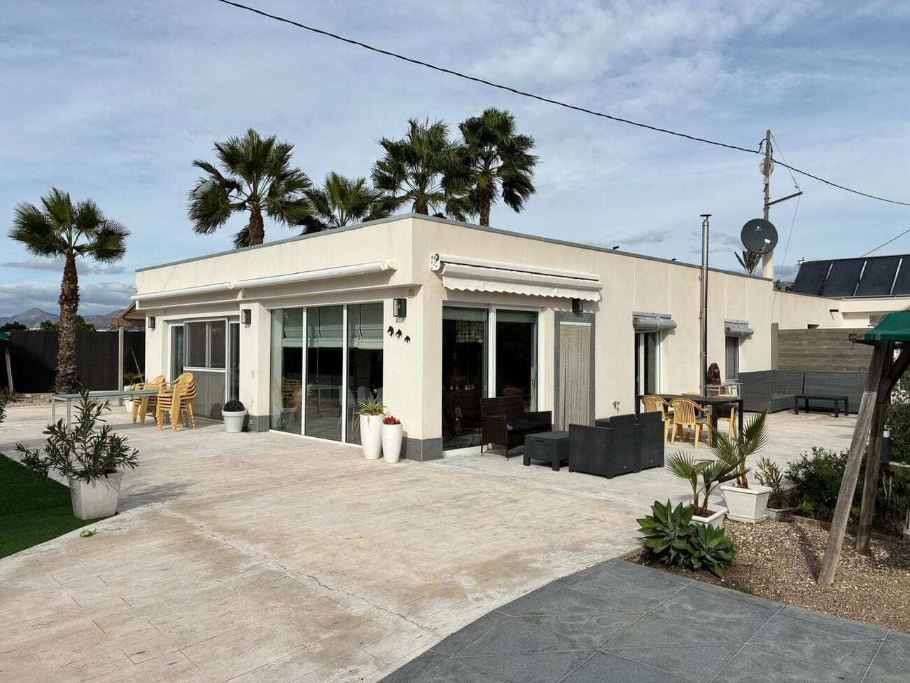 Exclusive 180 m² Villa in Crevillente – Luxury, Comfort & Great Investment PotentialAre you looking for a versatile, move-in-ready property with every comfort?This stunning villa in Crevillente is an exceptional opportunity – ideal as a family home, holiday residence, or a profitable investment on Spain’s sunny Costa Blanca.Layout & FeaturesLiving area: 180 m²Bedrooms: 5 spacious roomsBathrooms: 2 modern bathroomsKitchen: recently renovated and fully equippedStudio / independent apartment: with 1 bedroom, kitchen, and bathroom – perfect for guests, family, or rental incomeSustainable & Energy Efficient35 solar panels with 4 storage batteries – enjoy self-generated power day and nightCentral heating via air conditioning and pellet stove, ensuring year-round comfortConnected to mains waterOutdoor Living & ExtrasPrivate 32 m² swimming pool, heated by 16 solar panels and a heat pump for year-round useGarage / storage area and barbecue space2,200 m² plot, fully maintained and in excellent conditionSpacious terraces and outdoor areas to enjoy the Mediterranean lifestyleLocationOnly 5 minutes by car from Crevillente town centre, with shops, bars, and all amenities25 minutes to Elche–Alicante Airport25 minutes to the beaches of the Costa BlancaExcellent connections to Alicante and MurciaA Unique OpportunityThis exclusive villa combines space, sustainability, and elegance in a prime location.Perfect for anyone seeking a comfortable family home, a sunny second residence, or a property with excellent rental potential.