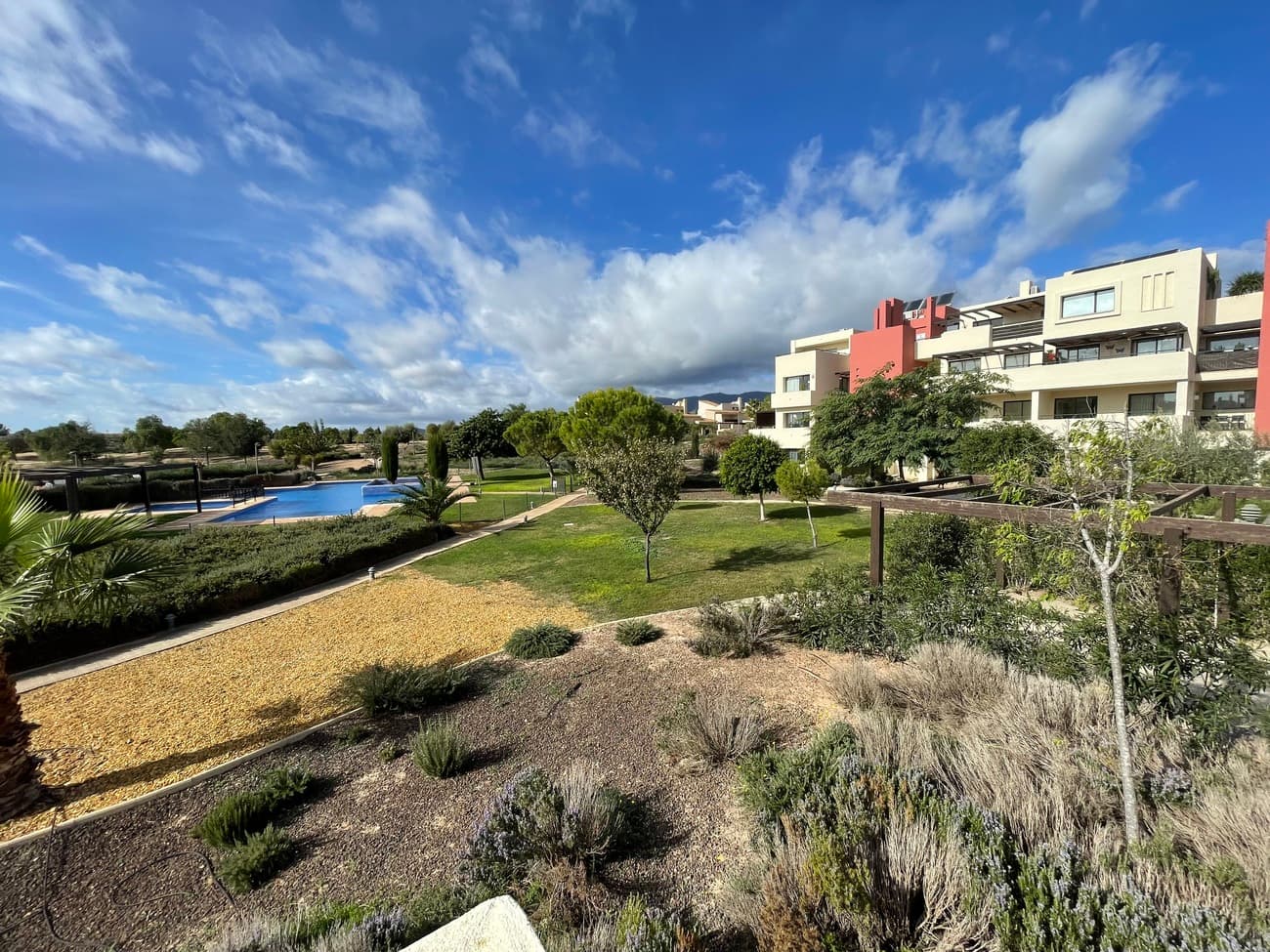  Bright Apartment on Corvera Golf on the first floorWelcome to this spacious and furnished apartment in the exclusive Corvera golf resort (Murcia) – a place where comfort, sunshine and outdoor living come together. Smartly Designed & ComfortableThe spacious property of approximately 76.34 m² has 2 comfortable bedrooms and 2 bathrooms (1 with a Japanese toilet), both of which have been recently completely renovated. There is also central heating, and the property is adapted for disabled access. Light & SpaceThe bright living room opens onto the sunny south-west facing terrace of 23.47 m². In addition, the master bedroom has a second terrace of 10 m² where you can enjoy the evening sun. Ready to Move In & FurnishedThe flat is offered furnished, ready to move into. There is also a private parking space and an underground storage room. Prime location on Corvera golf courseThe flat is located in a gated and exclusive complex. Covera golf is a luxury resort, which is currently under construction. The golf course and clubhouse will be completed in 2026, so this is a real investment opportunity! A unique opportunity for those who want to experience the best of the Costa Blanca – with sun, luxury and privacy, every day. 