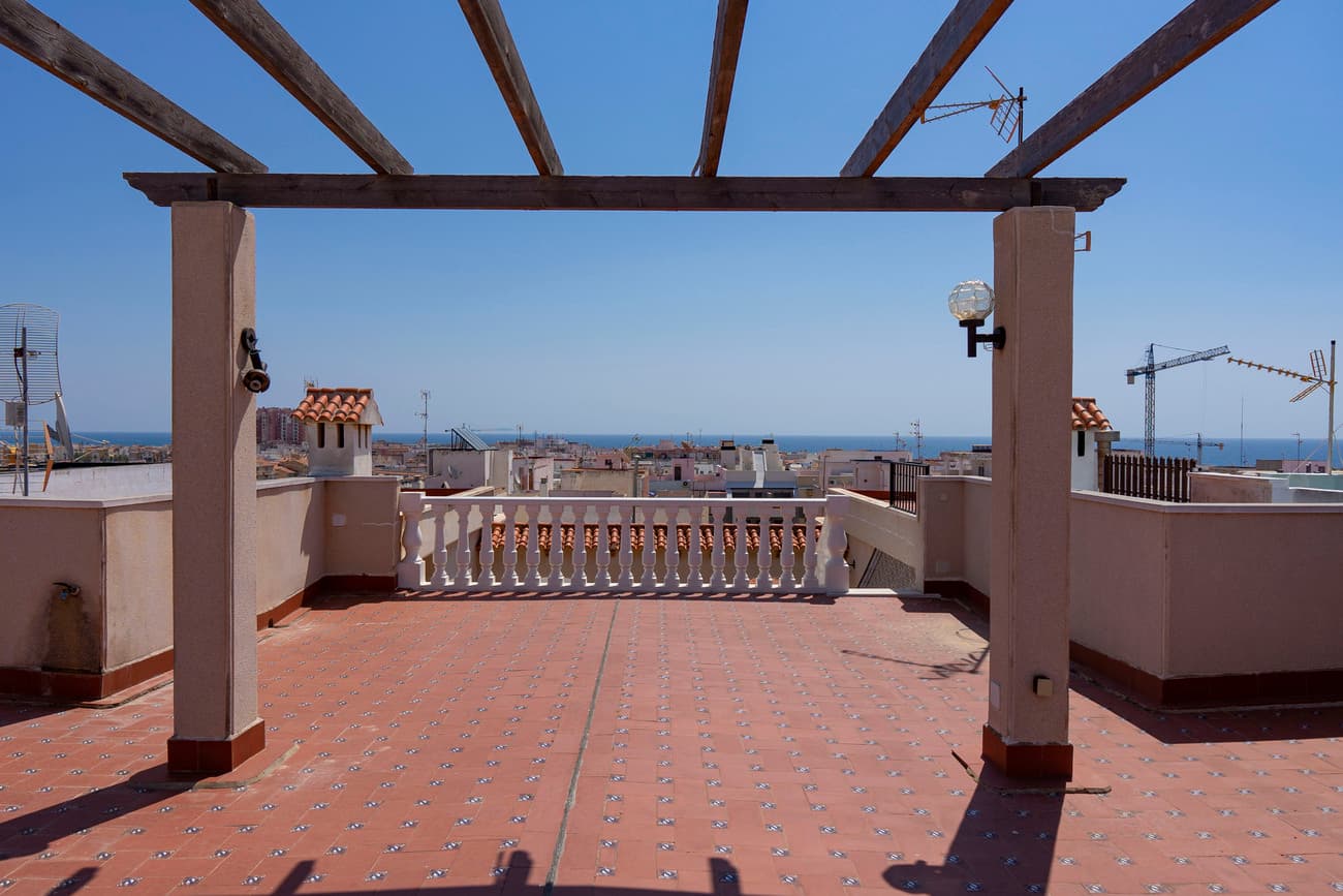UNIQUE! Spectacular duplex penthouse with unobstructed views of the sea in Torrevieja.In a central area of Torrevieja and just 500 meters from Playa del Cura and Playa Los Locos, this duplex penthouse with 7 bedrooms and 4 full bathrooms is located on the 5th floor of a building with an elevator.Highlights:• All the rooms of the house are very spacious, thanks to its 216 m2 of constructed area.• 2 elelvators leading to the floor where you will find two seperate doors to the house and a third exclusive door leading to solarium for private direct access.• Large wooden windows with sun protection glazing and wooden shutters.• High ceilings, piped music throughout the house, fireplace in the living room, good construction quality, very good condition.• Barbecue with stone sink on the solarium.• Unobstructed views of the sea from the solarium.• Classic furniture and solid and antique.• Communal swimming pool.• Possibility of having 2 garage spaces for an extra price.Distribution of the property:On the ground floor it has a spacious living room, independent kitchen with gallery, pantry, 3 double bedrooms, 2 full bathrooms and a terrace.On the first floor, there are 4 bedrooms, 2 full bathrooms (one of them with a round SPA-type bathtub), a large terrace and a private solarium.TABLE OF BUILT SURFACESAttic floor area without terraces 254.50 m2Terrace surface: 183.05 m2Total area: 437 m2BREAKDOWN OF USEFUL SURFACESGround floor 133.35 m2 useful housing + 17.80 m2 terraceFirst floor 78.5 m2 useful housing + 55.95 m2 terraceCovered floor 109.30 m2SPECIAL FEATURES:This exclusive penthouse was built by the founder of a construction company with a recognized business history in the province of Alicante, more than 40 years in the real estate sector guaranteed his experience. The house was used as a holiday home by the businessman's family, although it is prepared to be used as a frequent or permanent home.Its large size offers various possibilities. It could be easily divided into 2 independent apartments or, have an apartment with 3 bedrooms and 2 bathrooms on the ground floor and use the upper floor for a professional office.ENVIRONMENT AND SERVICESIn the near surroundings we will find large food stores, pharmacies, banks, cafes, hairdressers, etc. In the center of Torrevieja located a few minutes away we have multiple shops and service companies.COMMUNICATIONSThe Torrevieja central bus station is close to the house and on the N-332 national road or the AP7 motorway we can visit the different cities of the Costa Blanca.Alicante International Airport with regular flights to all of Europe is a 40-minute drive away.The owner listens to purchase proposals, book your appointment now to visit this exclusive penthouse.