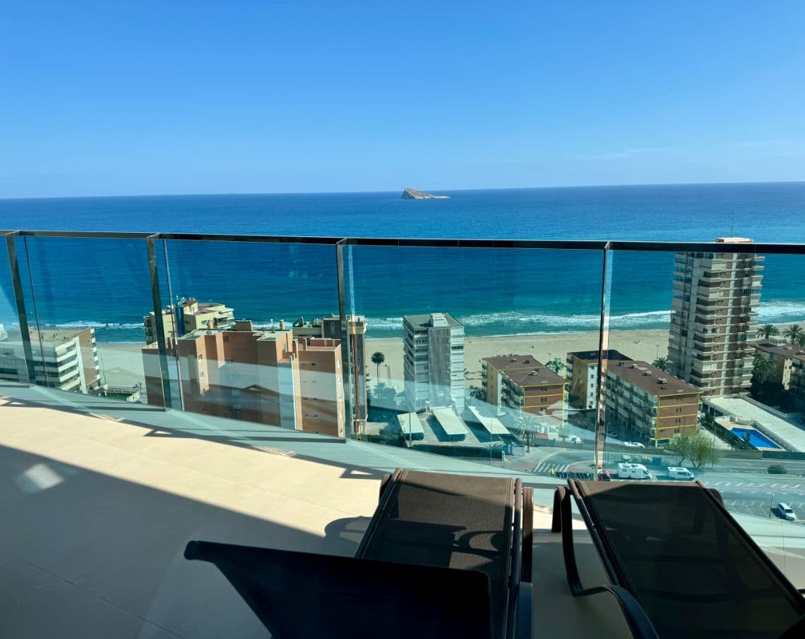 Charm and Comfort in Benidorm  Discover a charming apartment in the coveted Poniente area of Benidorm, where coastal living meets modern comfort. This cozy home with a built area of 98 m² offers you the opportunity to enjoy a serene environment full of possibilities.  Space Distribution  The apartment features two spacious bedrooms, ideal for families or those seeking extra space. The two carefully designed bathrooms ensure privacy and functionality, making this home a cozy retreat. The open-plan kitchen, bright and well-equipped, seamlessly integrates with the living room, creating the perfect social atmosphere for hosting friends and family.  Private Terrace  A standout feature of the property is its 20 m² terrace, a bright and open space oriented to the south. Here, you can enjoy moments of tranquility while indulging in the Mediterranean climate, perfect for outdoor dining or simply relaxing with a good book.  Amenities and Services  The apartment is presented in good condition, ready to move in. It includes modern amenities such as air conditioning and heating, ensuring a comfortable environment year-round. Additionally, the community offers a communal pool, perfect for refreshing yourself during the warm summer days. Other notable features include a garden, a garage, a storage room, and an elevator, all designed for your convenience.  Ideal Location  Located in one of the most attractive areas of Benidorm, the apartment benefits from excellent communications, making access to all necessary services easy and providing exceptional quality of life. The proximity to the beaches and leisure areas makes this apartment an attractive option for both permanent residence and investment.  Atmosphere and Lifestyle  This apartment is more than just a place to live; it’s a lifestyle. Imagine waking up each day to the sea breeze and enjoying sunsets from your own terrace. It’s a home that invites tranquility, sun enjoyment, and unforgettable moments with loved ones.