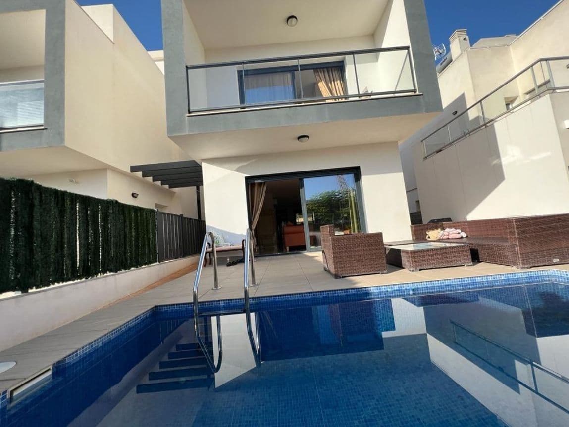Charm and Comfort in Polop  Discover this charming chalet in Polop, a gem located in the beautiful province of Alicante, where tranquility and the beauty of nature intertwine. This home, built in impeccable condition, offers a perfect refuge for those seeking a comfortable and well-equipped house, surrounded by a serene environment.    Layout and Spaces  With a functional design, this chalet features 3 cozy bedrooms and 3 bathrooms, providing spaciousness and privacy for the whole family. The open-plan kitchen harmoniously integrates with the living area, creating an ideal environment for sharing unforgettable moments. The south-facing orientation ensures an abundance of natural light, illuminating every corner of this home.    Amenities and Features  The property is equipped with air conditioning and pellet heating, guaranteeing optimum comfort throughout the year. Enjoy warm summer days in your private pool, a perfect place to relax and enjoy the sun. The chalet also includes an outdoor garden, where you can appreciate the beauty of the outdoors. The property is situated on a fenced plot, offering security and privacy.    Ideal Location  Polop stands out not only for its charming architecture and stunning views but also offers good connections to major access roads to the city and nearby points of interest. Its proximity to beaches, restaurants, and local services makes this chalet an attractive option for those looking to enjoy life on the Costa Blanca.    Investment Opportunity  If you are looking for a home that combines comfort, style, and an unbeatable location, this chalet in Polop is an unmissable opportunity. Ideal for both permanent residence and investment, don't wait any longer to visit this magnificent place that could become your next home.