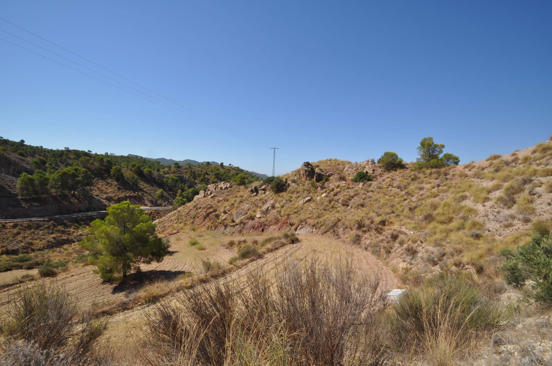 A lovely 5000m2 building plot near Macisvenda. With water and electric. Macisvenda is a lovely quiet village less than ten minutes drive into the beautiful town of Hondon de las Frailes with its beautiful bars and restaurants. Its a very international area, with people from different nationalites choosing this very traditional and picturesque area to live in. We have lots of building designs and can help you with every step of the build, should you want to build your own property.We are specialists in the Costa Blanca and Costa Calida specialising in the Alicante and Murcia Inland regions with a particular emphasis on Elda, Pinoso, Aspe, Elche and surrounding areas. We are an established, well known and trusted company that has built a solid reputation amongst buyers and sellers since we began trading in 2004. We offer a complete service with no hidden charges or surprises, starting with sourcing the property, right through to completion, and an unrivalled after sales service which includes property management, building services, and general help and advice to make your new house a home. With a portfolio of well over 1400 properties for sale, we are confident that we can help, so just let us know your preferred property, budget and location, and we will do the rest.