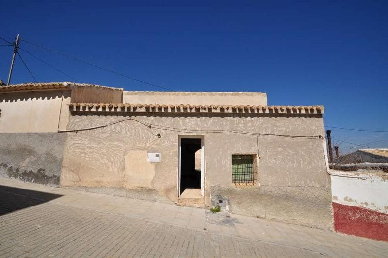 A country house for reform in the popular village of Raspay within walking distance of the villages 2 restaurants and a bar, it is also only a very short drive to the town of Pinoso where you will find all your day to day requirements and more. This property is structurally sound.We are specialists in the Costa Blanca and Costa Calida specialising in the Alicante and Murcia Inland regions with a particular emphasis on Elda, Pinoso, Aspe, Elche and surrounding areas. We are an established, well known and trusted company that has built a solid reputation amongst buyers and sellers since we began trading in 2004. We offer a complete service with no hidden charges or surprises, starting with sourcing the property, right through to completion, and an unrivalled after sales service which includes property management, building services, and general help and advice to make your new house a home. With a portfolio of well over 1400 properties for sale, we are confident that we can help, so just let us know your preferred property, budget and location, and we will do the rest.