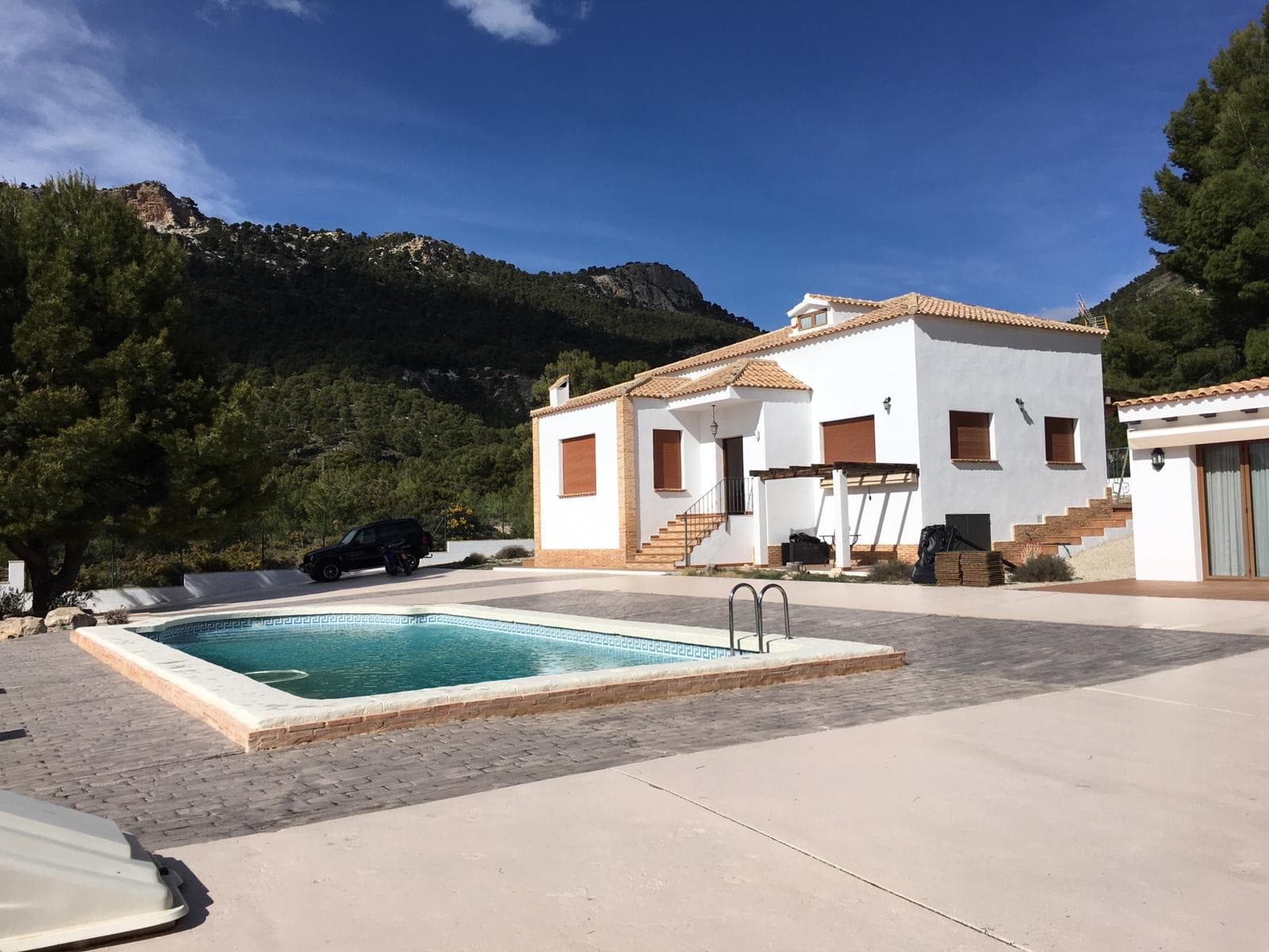 This luxurious villa is located in a privileged place of Castalla, it is a beautiful rural area, with stunning views of the mountains and the valleys that surround it. The property is located in a very quiet area with maximum privacy.As you can see in the photos, both the main house and the gardens are beautiful. The plot has 1600 square meters, in which we can find large and tall shade trees, a nice garden, a picnic area, a playground for children, a large swimming pool ... The plot is fully fenced, and the Entry door is electric, it has everything you need!The property has 171 square meters built, also on the outside, as we can see in the photos there is a construction that is a barbecue area, which has a toilet, a storage room,...Upon entering the main house, there is a small entrance hall, on the left we find a cozy living room with fireplace, and beautiful views of the garden and the pool. On the right another lounge-dining room. Also on this main floor there is a large good sized kitchen for a breakfast table.The main house has 5 good sized bedrooms and 2 full bathrooms, as well as storage space, very bright, finishes and first quality furniture ...If you have liked this property, do not hesitate to contact us to arrange a visit, we will be happy to help you!We are specialists in the Costa Blanca and Costa Calida specialising in the Alicante and Murcia Inland regions with a particular emphasis on Elda, Pinoso, Aspe, Elche and surrounding areas. We are an established, well known and trusted company that has built a solid reputation amongst buyers and sellers since we began trading in 2004. We offer a complete service with no hidden charges or surprises, starting with sourcing the property, right through to completion, and an unrivalled after sales service which includes property management, building services, and general help and advice to make your new house a home. With a portfolio of well over 1400 properties for sale, we are confident that we can help, so just let us know your preferred property, budget and location, and we will do the rest.