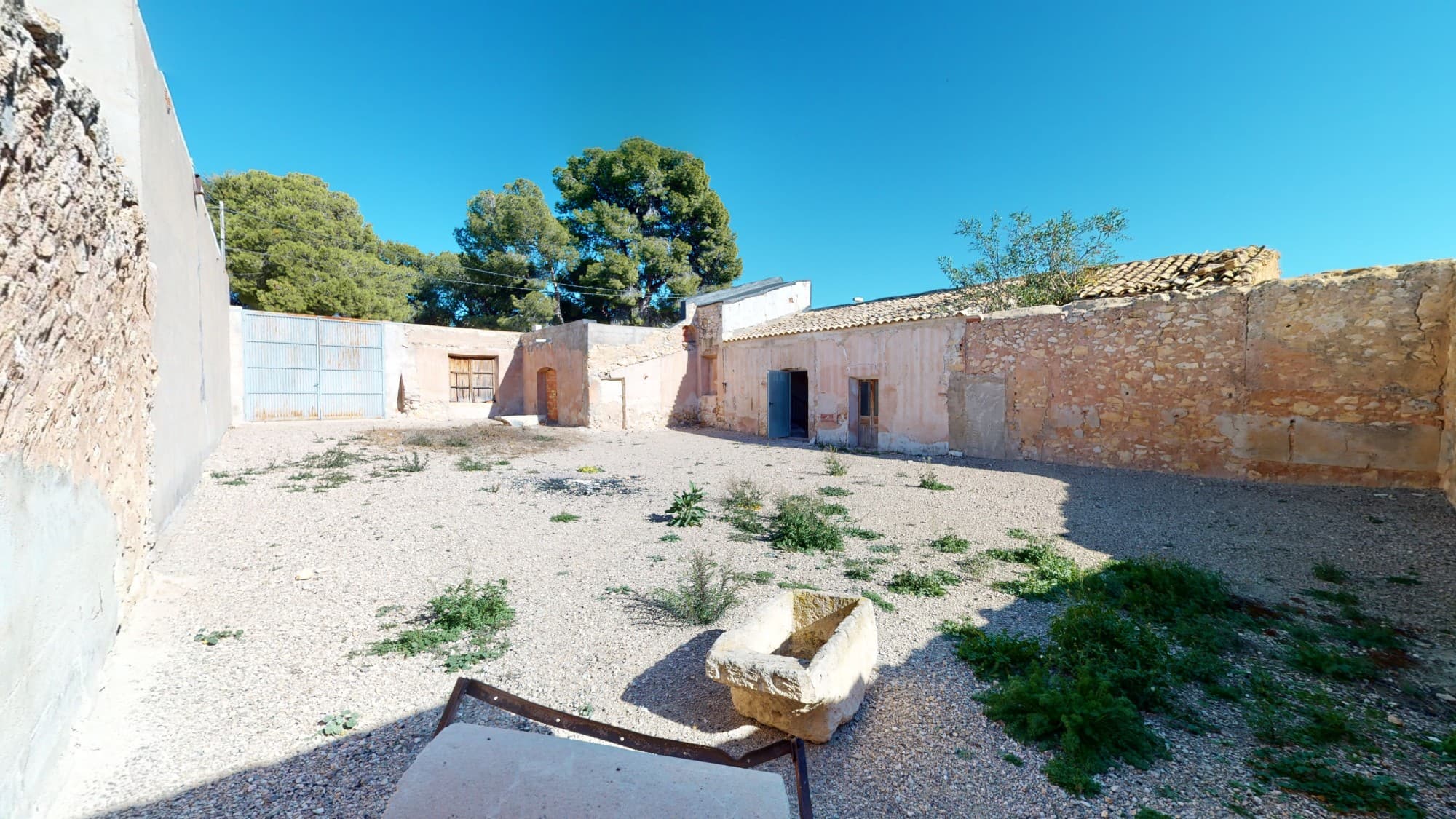 A lovely country property with its own courtyard for reformation in the pretty village of Torre del Rico over looking the village square. Currently here are 2 bedrooms and space for bathroom, a lounge with an original fireplace and an old large bodega for conversion. The property also benefits from a roof terrace and a fenced garden area. Access to the property is via a tarmac road.We have a video on floor plan available, please click on the VIEW VIDEO tab above. We are specialists in the Costa Blanca and Costa Calida specialising in the Alicante and Murcia Inland regions with a particular emphasis on Elda, Pinoso, Aspe, Elche and surrounding areas. We are an established, well known and trusted company that has built a solid reputation amongst buyers and sellers since we began trading in 2004. We offer a complete service with no hidden charges or surprises, starting with sourcing the property, right through to completion, and an unrivalled after sales service which includes property management, building services, and general help and advice to make your new house a home. With a portfolio of well over 1400 properties for sale, we are confident that we can help, so just let us know your preferred property, budget and location, and we will do the rest.
