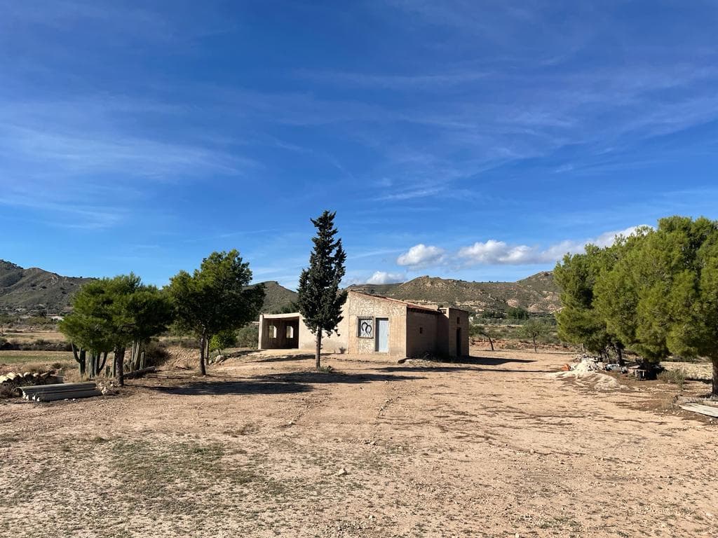 This country house has 75m2 built on a plot of 14.771m2. This country house needs a little bit of work, it has 2 bedrooms and 1 bathroom.It is also connected to the electric and also has drinking and irrigation water.We have a large portfolio of properties in the Costa Blanca and Costa Calida areas, specialising in country properties, villas, fincas, building plots and design and build options in the Alicante and Murcia regions with a particular emphasis on Elda, Monovar, Pinoso, Sax, Villena, Aspe, Fortuna, Albacete and many more surrounding areas. We have been established since 2004 and have decades of experience between the team which we bring to bear to help you find and secure your new dream home. We help you every step of the way to make sure your purchase in Spain is safe and hassle free. We are not here to sell you a property, we are here to help you realise your dream and find what is right for you. With us you are in the safest hands. Contact us now to have a no obligation chat about how you too can realise your dreams.