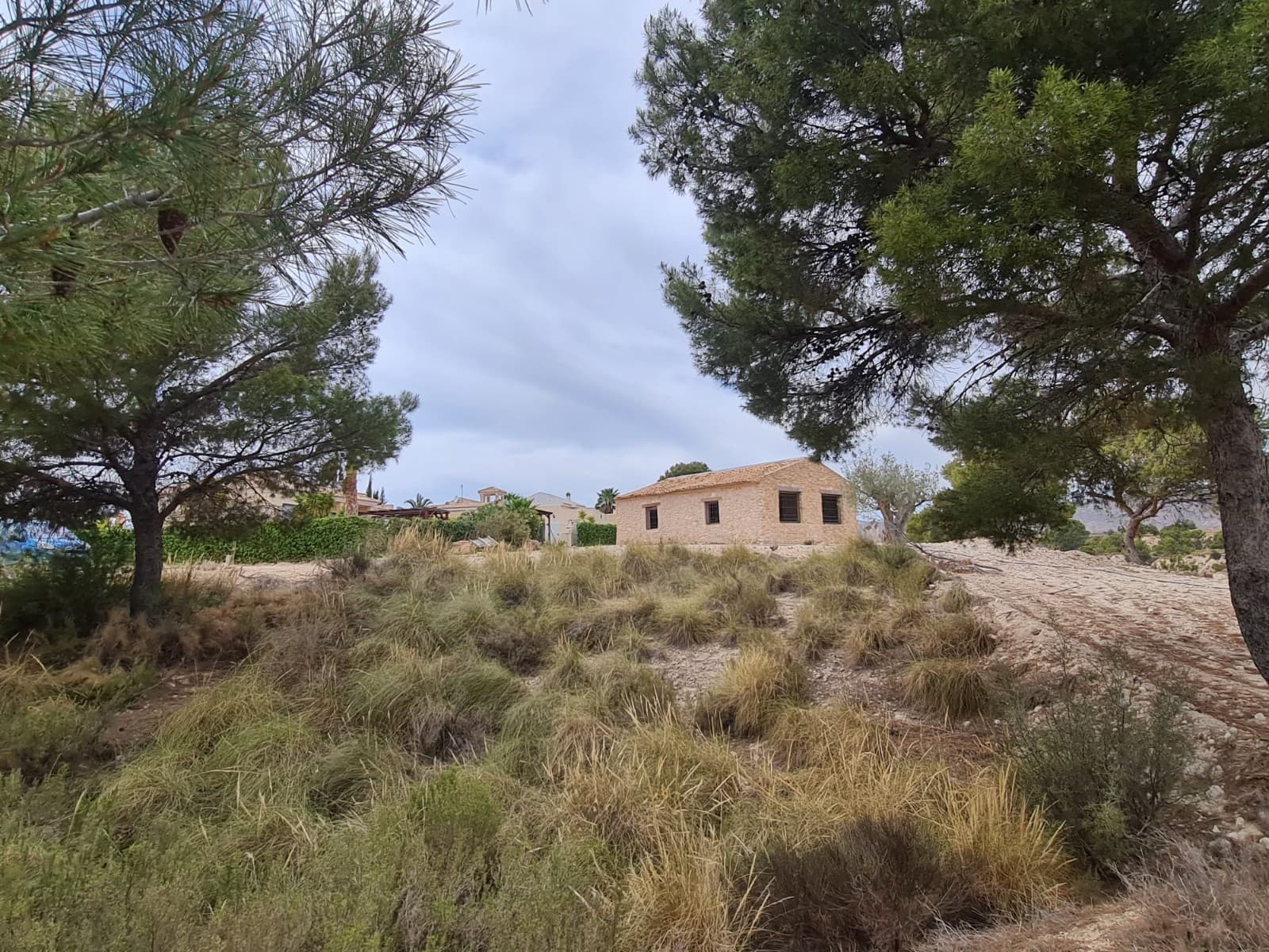 Looking for your next renovation project? Look no further than this charming old country house with a great potential for a holiday home! With 114m2 of built space and a sprawling 18847m2 of land, the possibilities for this property are endless.While the interior of the house needs some work, it's easy to see the potential that lies within. With some careful planning and thoughtful renovations, you could transform this house into the perfect holiday retreat for you and your family.The land surrounding the property is truly breathtaking, with ample space for gardens, orchards, and outdoor entertaining areas. Imagine spending lazy afternoons lounging in the shade of the trees, sipping on a cool drink while the kids play in the expansive yard.And with so much land to work with, the possibilities for expansion and improvement are truly endless. Whether you're dreaming of adding a swimming pool, a guest house, or even a small farm, this property can accommodate your wildest dreams.Of course, the location is also a major selling point. Nestled in the heart of the countryside, this house offers the perfect escape from the hustle and bustle of city life. And yet, it's still close enough to town to offer easy access to all the amenities you need.So if you're looking for a renovation project with great potential, this old country house is definitely worth a look. With some TLC and a bit of imagination, it could be transformed into the holiday home of your dreams.We have a large portfolio of properties in the Costa Blanca and Costa Calida areas, specialising in country properties, villas, fincas, building plots and design and build options in the Alicante and Murcia regions with a particular emphasis on Elda, Monovar, Pinoso, Sax, Villena, Aspe, Fortuna, Albacete and many more surrounding areas. We have been established since 2004 and have decades of experience between the team which we bring to bear to help you find and secure your new dream home. We help you every step of the way to make sure your purchase in Spain is safe and hassle free. We are not here to sell you a property, we are here to help you realise your dream and find what is right for you. With us you are in the safest hands. Contact us now to have a no obligation chat about how you too can realise your dreams.