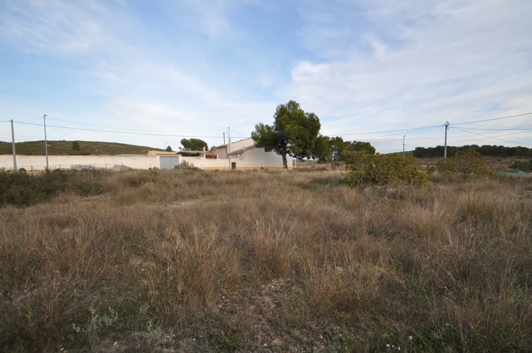 Presenting an exceptional opportunity, we proudly introduce a remarkable plot of land located on the outskirts of town. This expansive parcel boasts an impressive size of 1,992 square meters, offering ample space for your dream property or a promising development project where you could build 3 or 4 houses - because it is urban the plot can be split. One of the standout features of this land is its convenient access to essential utilities. With water and electricity connections readily available, the process of establishing necessary infrastructure and services becomes significantly easier and more efficient.Positioned just a few kilometers away from the town, this land benefits from a strategic location that perfectly balances the tranquility of rural living with the convenience of nearby amenities. Enjoy the serenity of a peaceful environment while still having effortless access to shops, schools, healthcare facilities, and other essential services provided by the town.Whether you envision building a spacious family home, launching a thriving business venture, or embarking on an innovative development project, this plot of land presents endlessWe have a large portfolio of properties in the Costa Blanca and Costa Calida areas, specialising in country properties, villas, fincas, building plots and design and build options in the Alicante and Murcia regions with a particular emphasis on Elda, Monovar, Pinoso, Sax, Villena, Aspe, Fortuna, Albacete and many more surrounding areas. We have been established since 2004 and have decades of experience between the team which we bring to bear to help you find and secure your new dream home. We help you every step of the way to make sure your purchase in Spain is safe and hassle free. We are not here to sell you a property, we are here to help you realise your dream and find what is right for you. With us you are in the safest hands. Contact us now to have a no obligation chat about how you too can realise your dreams.