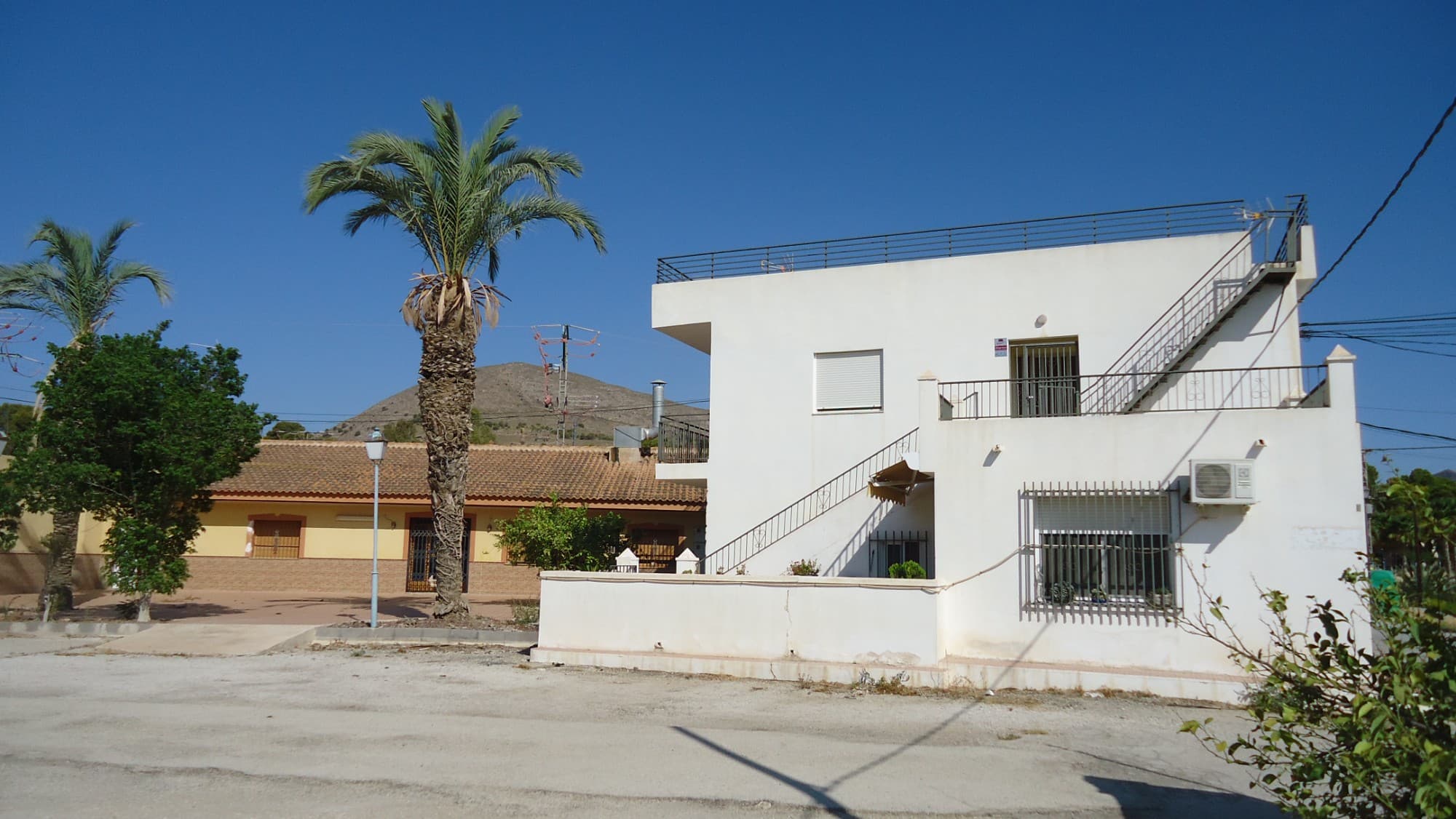 An exciting opportunity to acquire a well-established campsite in Fortuna, Murcia, known for its wellness tourism and proximity to the famous local spa. This campsite spans a spacious area with approximately 110 caravan pitches, complete with fully equipped changing rooms, a laundry facility, and various well-maintained amenities. Guests can enjoy dining at the on-site restaurant, which features multiple rooms and a large bar, creating a welcoming space for gatherings and events.Included in the property are two houses, one above the other, suitable for personal residence or as potential tourist rentals, adding extra value and flexibility to the investment. Situated close to the local spa, this property is perfectly positioned to appeal to wellness tourism seekers and travelers looking for a peaceful retreat in this popular region.The Area:Fortuna, Murcia, is renowned for its natural thermal springs and spa facilities, drawing wellness enthusiasts year-round. The town combines a laid-back atmosphere with essential services, while nearby mountains and natural reserves provide ample opportunities for hiking and outdoor activities. With Murcia city just a short drive away, Fortuna offers both a serene environment and access to cultural attractions, making it an ideal destination for visitors seeking relaxation and rejuvenation amidst beautiful landscapes.We have a large portfolio of properties in the Costa Blanca and Costa Calida areas, specialising in country properties, villas, fincas, building plots and design and build options in the Alicante and Murcia regions with a particular emphasis on Elda, Monovar, Pinoso, Sax, Villena, Aspe, Fortuna, Albacete and many more surrounding areas. We have been established since 2004 and have decades of experience between the team which we bring to bear to help you find and secure your new dream home. We help you every step of the way to make sure your purchase in Spain is safe and hassle free. We are not here to sell you a property, we are here to help you realise your dream and find what is right for you. With us you are in the safest hands. Contact us now to have a no obligation chat about how you too can realise your dreams.