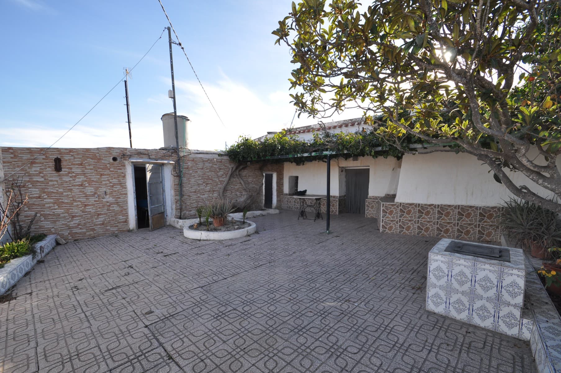 Discover the unique appeal of this spacious cave house located just outside Pinoso. Set on a nearly 670m² fenced plot, this property offers privacy, comfort, and great outdoor spaces.Inside, you'll find four bedrooms and two bathrooms, along with a cozy living room featuring a fireplace—perfect for year-round comfort. The home also includes a beautiful courtyard with space for a small garden, ideal for relaxing outdoors.A second courtyard, connected to the garage, features a built-in BBQ area, making it a great spot for entertaining. Additionally, there's a carport for extra parking. The property enjoys wonderful views, adding to its charm.If you liked this property, do not hesitate to contact us to organize a visit, we will be happy to help you!