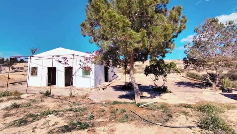 Discover a fantastic opportunity to create your ideal country home just outside of Abanilla. This 82 m² property is a blank canvas, featuring two existing bedrooms and two additional rooms ready to be transformed into a kitchen and bathroom, allowing for full customization. Outside, the property includes a basic toilet and sits on a vast 14,000 m² plot, providing extensive space for gardens, orchards, or outdoor living areas. With convenient access via two tarmac roads, the property is equipped with mains electricity, mains water, and irrigation water, ensuring essential utilities are already in place.About the Area:Located just 2 km from the charming town of Abanilla, this property combines the peace of rural life with the convenience of nearby amenities. Abanilla offers a welcoming community with a variety of shops, restaurants, and cultural sites. Known for its natural beauty, the area is rich in scenic trails, almond orchards, and olive groves, making it ideal for those who enjoy the outdoors. With the region's mild climate, this property offers year-round potential for enjoying the peaceful surroundings and creating a tranquil countryside retreat.Additionally, there is the option to purchase an adjacent plot for just €19,000. That additional plot can be segregated and built on each of them.We have a large portfolio of properties in the Costa Blanca and Costa Calida areas, specialising in country properties, villas, fincas, building plots and design and build options in the Alicante and Murcia regions with a particular emphasis on Elda, Monovar, Pinoso, Sax, Villena, Aspe, Fortuna, Albacete and many more surrounding areas. We have been established since 2004 and have decades of experience between the team which we bring to bear to help you find and secure your new dream home. We help you every step of the way to make sure your purchase in Spain is safe and hassle free. We are not here to sell you a property, we are here to help you realise your dream and find what is right for you. With us you are in the safest hands. Contact us now to have a no obligation chat about how you too can realise your dreams.