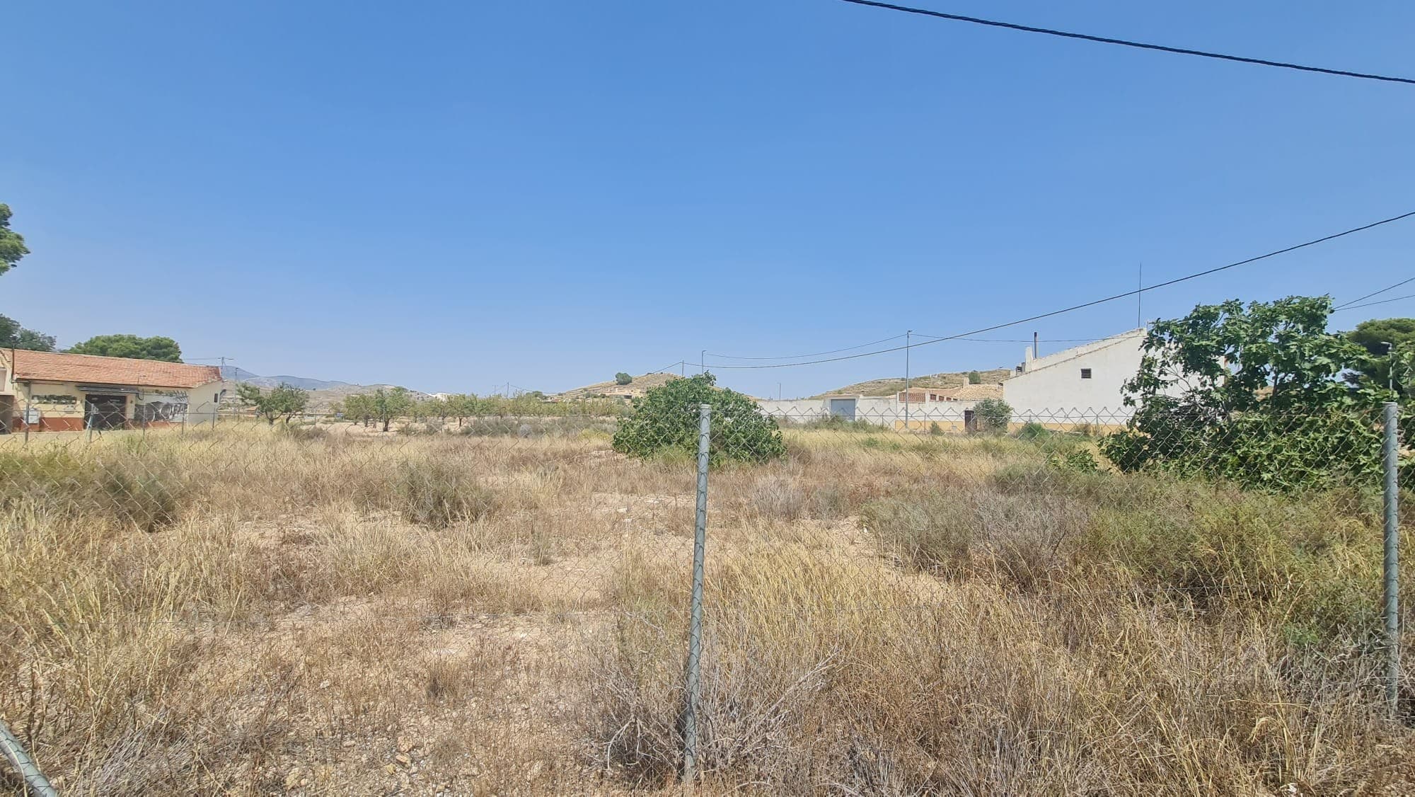 A great opportunity to buy a 1,991 m² urban plot in Los Gabrieles, Cañada del Trigo. The plot has easy access from the road and is within walking distance of local amenities.Set in a quiet and scenic area, this land offers plenty of space to build your dream home or a weekend retreat. Its size and location provide flexibility for a range of building projects.Whether for a permanent home or a getaway property, this plot is a solid investment in a peaceful area with easy access to nearby towns.We have a large portfolio of properties in the Costa Blanca and Costa Calida areas, specialising in country properties, villas, fincas, building plots and design and build options in the Alicante and Murcia regions with a particular emphasis on Elda, Monovar, Pinoso, Sax, Villena, Aspe, Fortuna, Albacete and many more surrounding areas. We have been established since 2004 and have decades of experience between the team which we bring to bear to help you find and secure your new dream home. We help you every step of the way to make sure your purchase in Spain is safe and hassle free. We are not here to sell you a property, we are here to help you realise your dream and find what is right for you. With us you are in the safest hands. Contact us now to have a no obligation chat about how you too can realise your dreams.