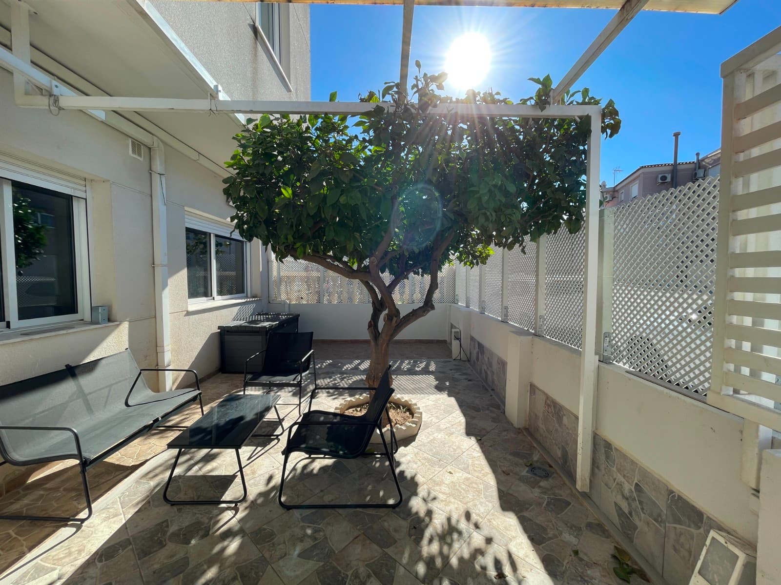 Spacious 5-bedroom family home in the heart of AlgorfaIntroducing this exceptional terraced house, beautifully renovated and impressively spacious, located in the charming village of Algorfa. Ideal for families seeking comfort, generous space and proximity to all amenities, it offers the perfect blend of modern living and traditional village character.Upon entering, a welcoming private terrace leads into a bright open-plan living area that combines the lounge, dining room and a contemporary kitchen—perfect for everyday living and entertaining. The main floor also includes two large double bedrooms, a stylish bathroom and a generous garage with an automatic door, providing parking and additional storage space.Upstairs, the property continues to impress with three further bedrooms, including an exceptionally large master bedroom, as well as a family bathroom. From this level, there is direct access to the private solarium—an ideal spot to unwind and enjoy panoramic views of the surrounding landscape.The location is outstanding: just a short walk from the medical centre, school, shops, bars, restaurants and all essential services. The municipal swimming pool is also within easy reach.With its generous proportions, recent renovation and unbeatable location, this property offers both an exceptional family home and a great investment opportunity in one of Costa Blanca's most sought-after villages.